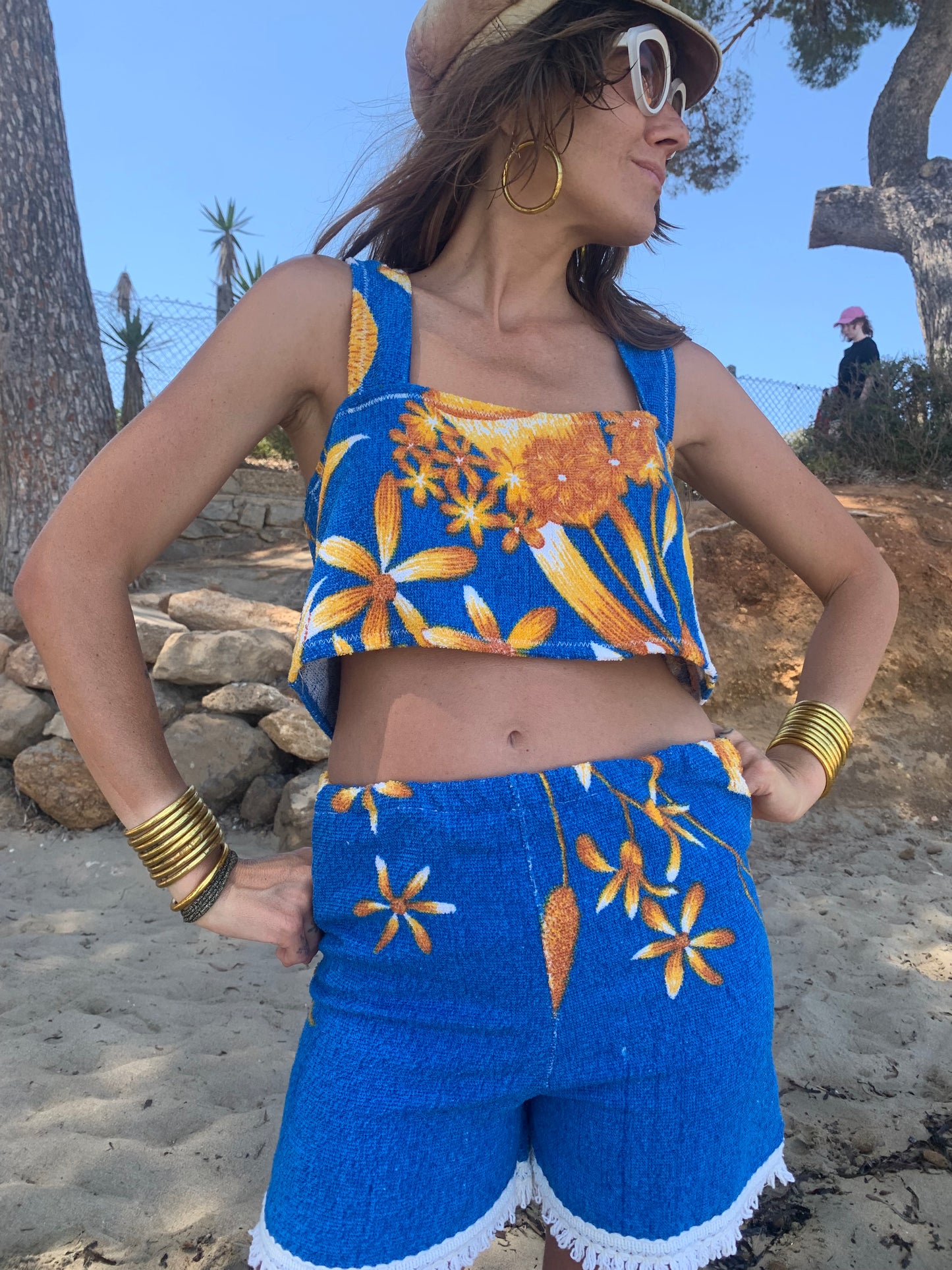 Up-cycled terry towelling shorts only by Vagabond Ibiza bright blue with orange floral detail