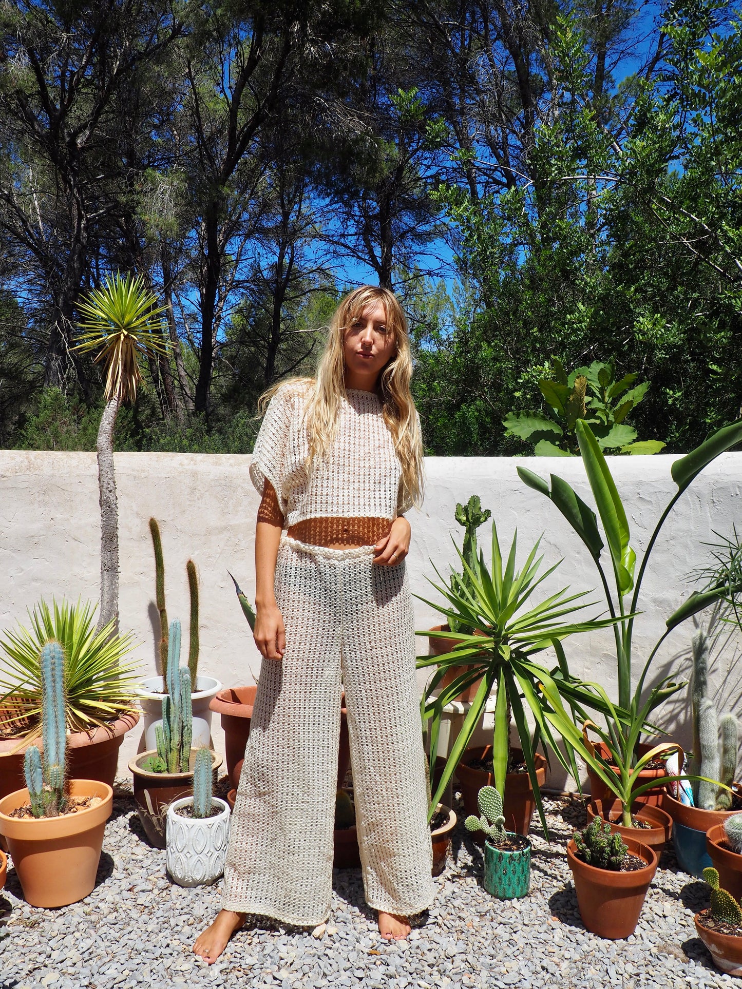 Up-cycled cream mesh woven shear wide leg pants made by Vagabond Ibiza