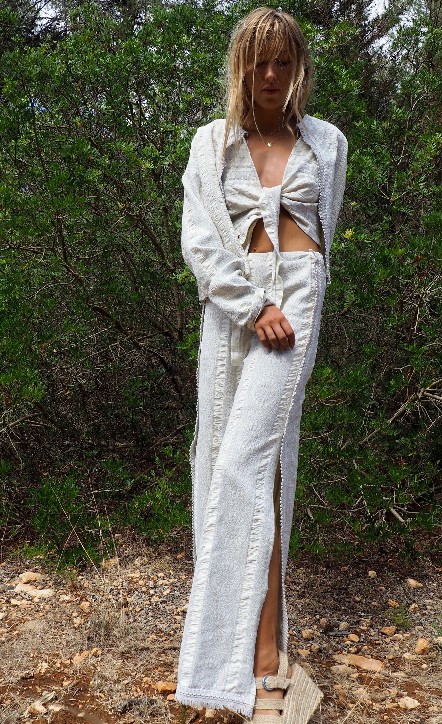 Up-cycled heavy cream and gray cotton woven textile wide leg pants with elastics and waist and side split details made by Vagabond Ibiza
