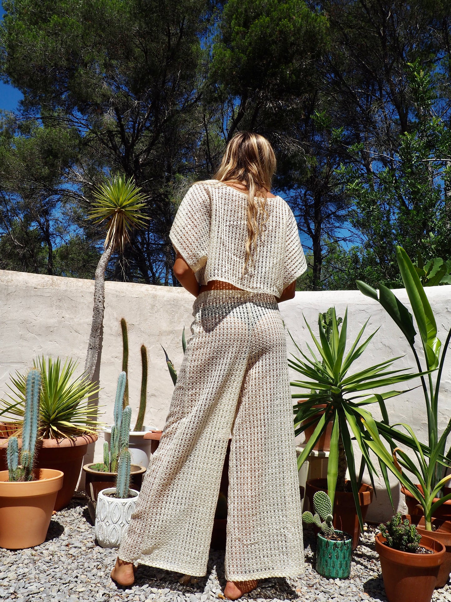 Up-cycled cream mesh woven shear wide leg pants made by Vagabond Ibiza