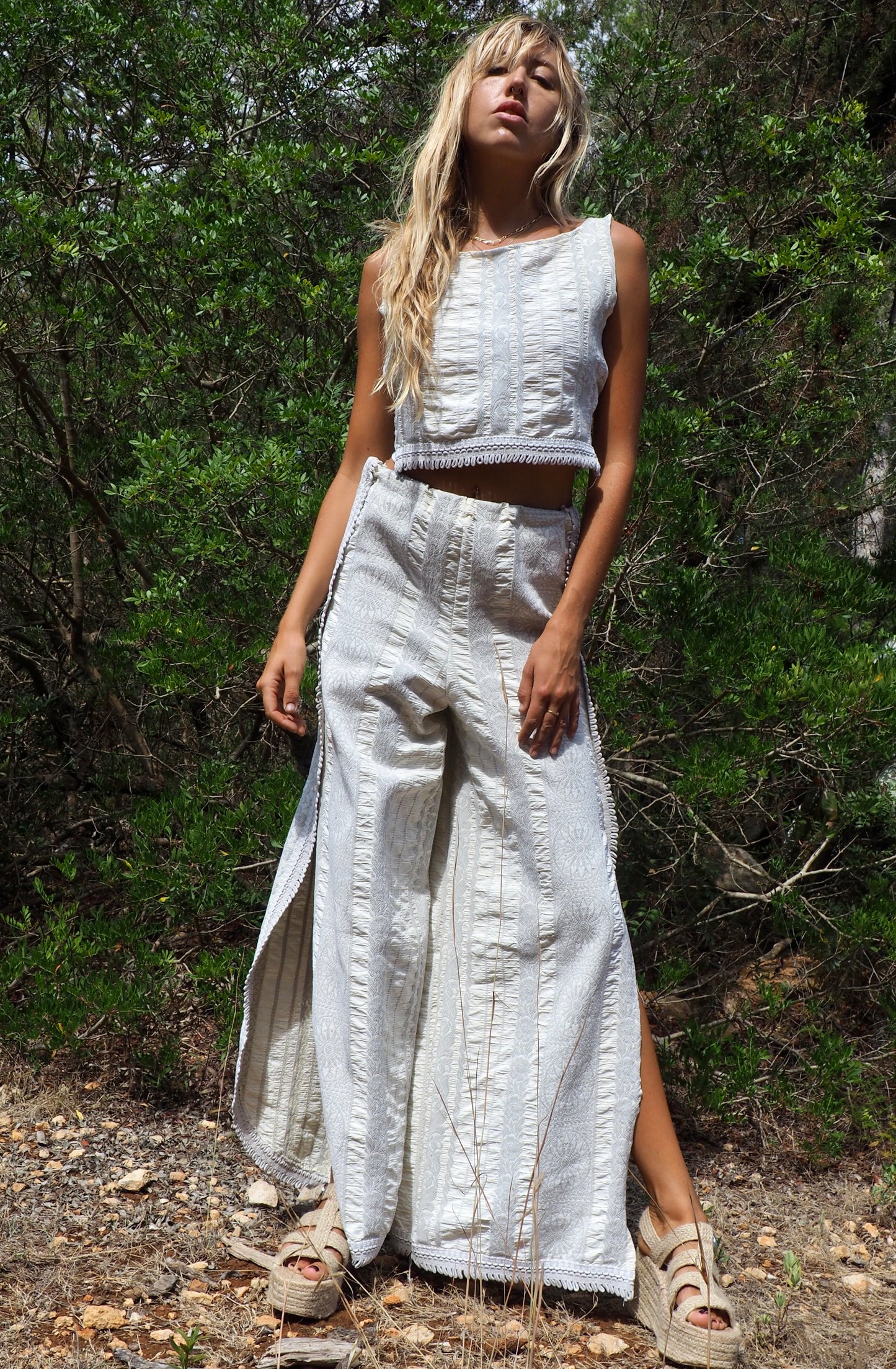 Up-cycled heavy cream and gray cotton woven textile wide leg pants with elastics and waist and side split details made by Vagabond Ibiza