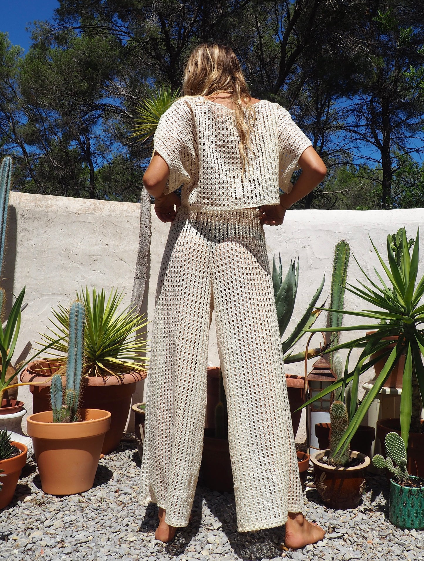 Up-cycled cream mesh woven shear wide leg pants made by Vagabond Ibiza