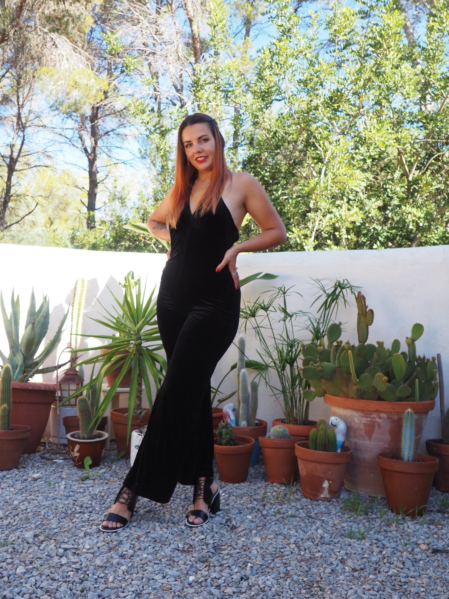 Vintage black thin velvet halter neck jumpsuit with bell bottom flare with stretch