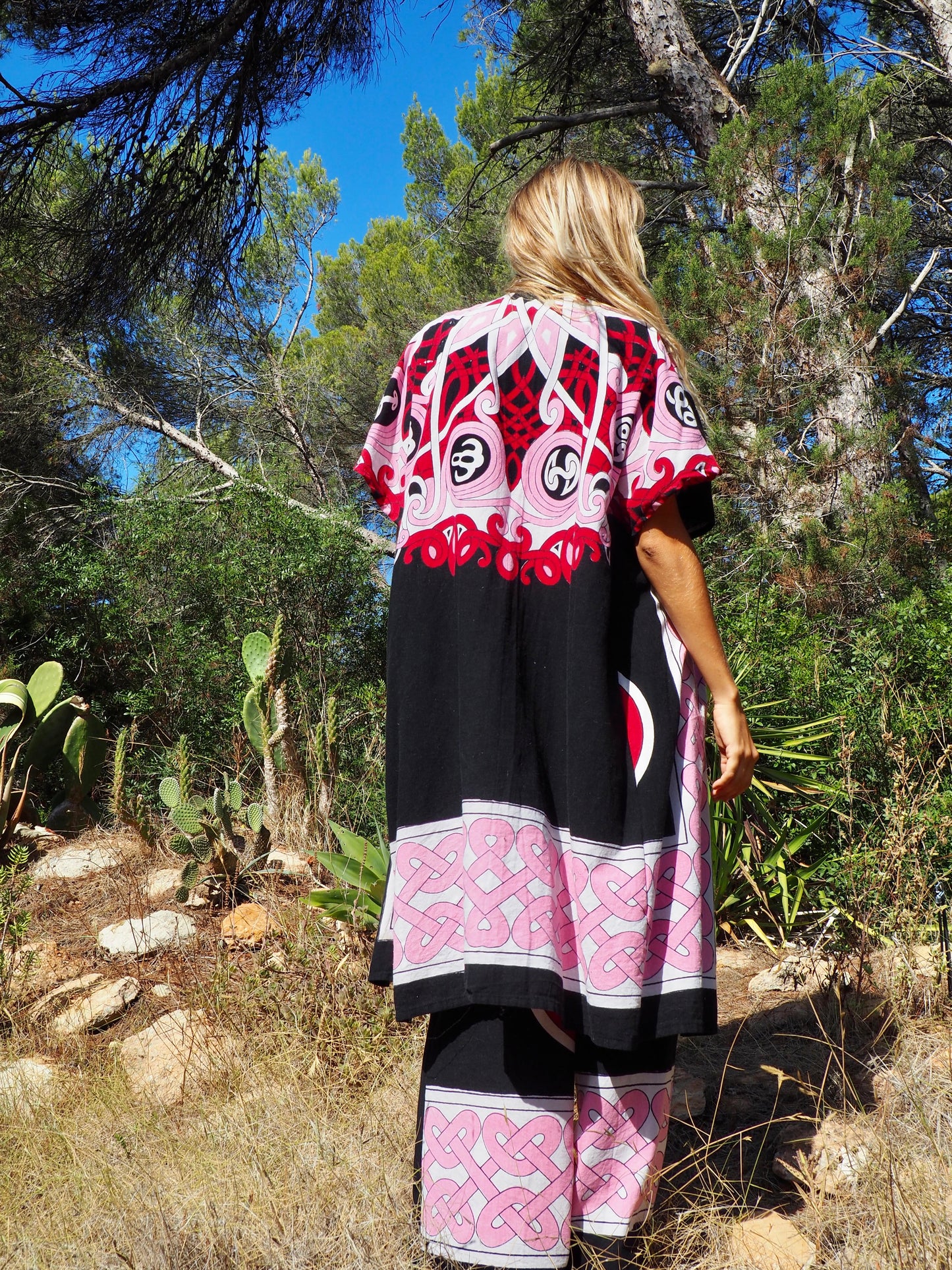 Up-cycled cotton short sleeve kimono jacket in pink and black with vibrant print design and circular motifs by Vagabond Ibiza