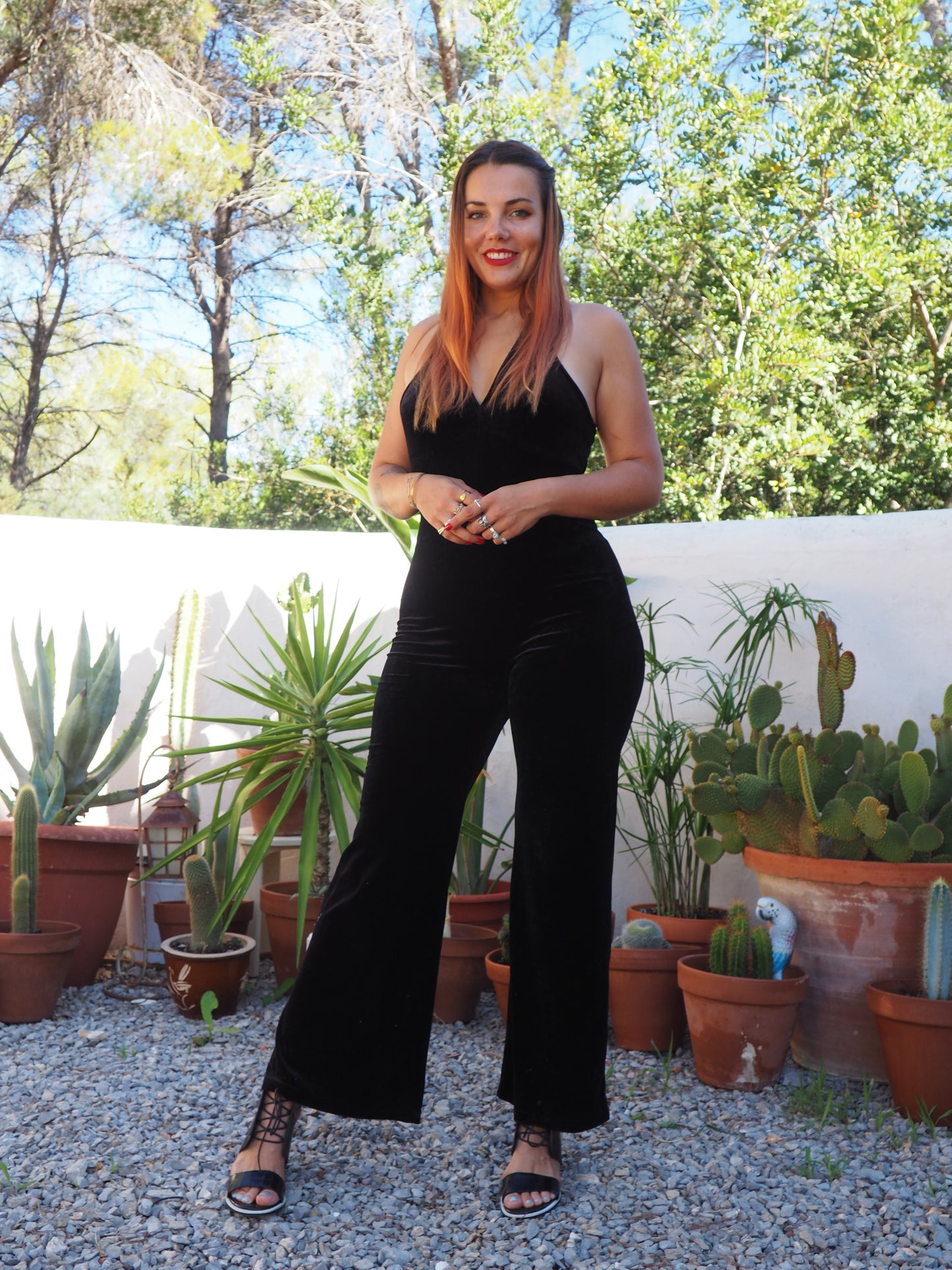 Vintage black thin velvet halter neck jumpsuit with bell bottom flare with stretch