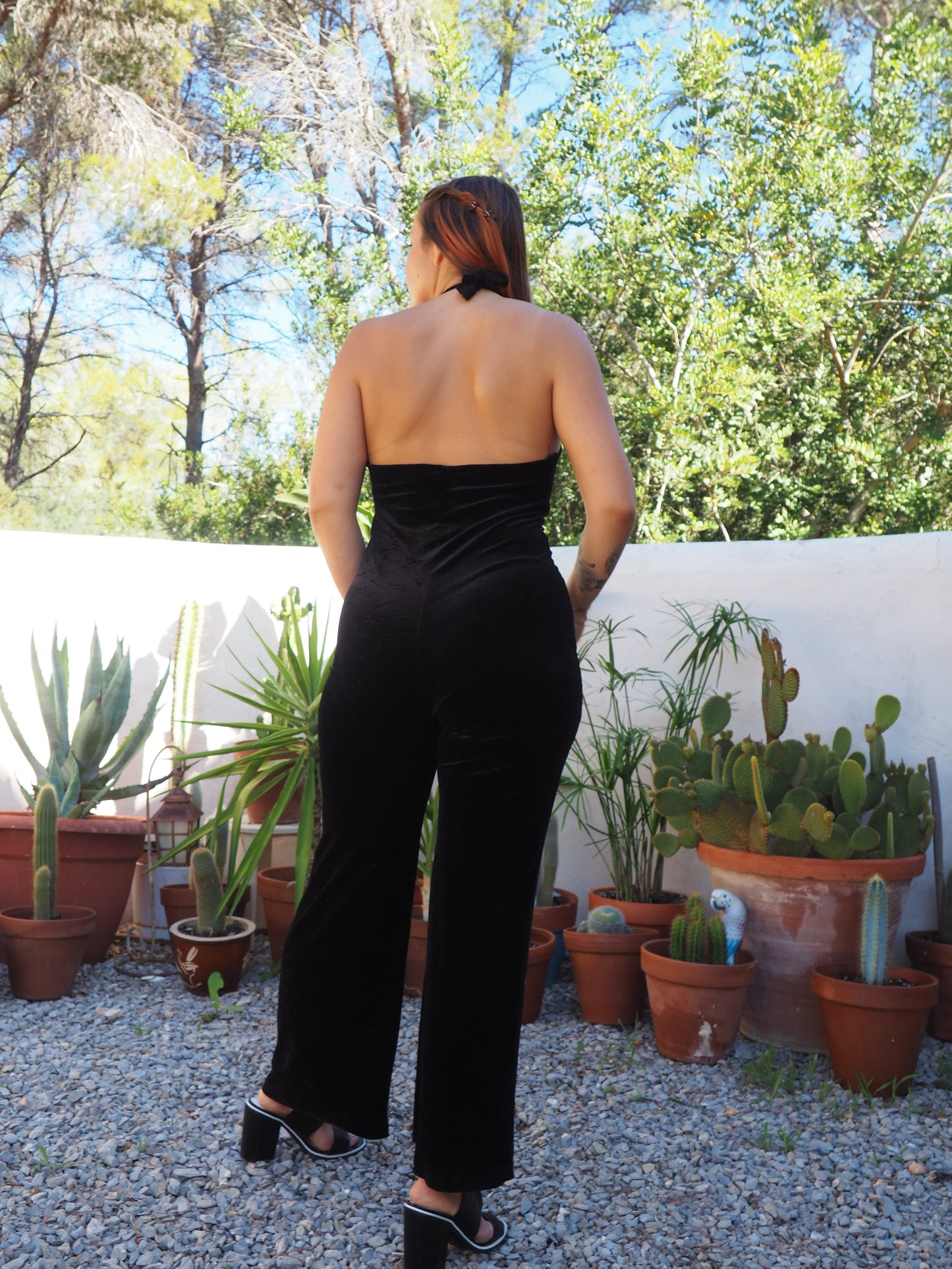 Vintage black thin velvet halter neck jumpsuit with bell bottom flare with stretch