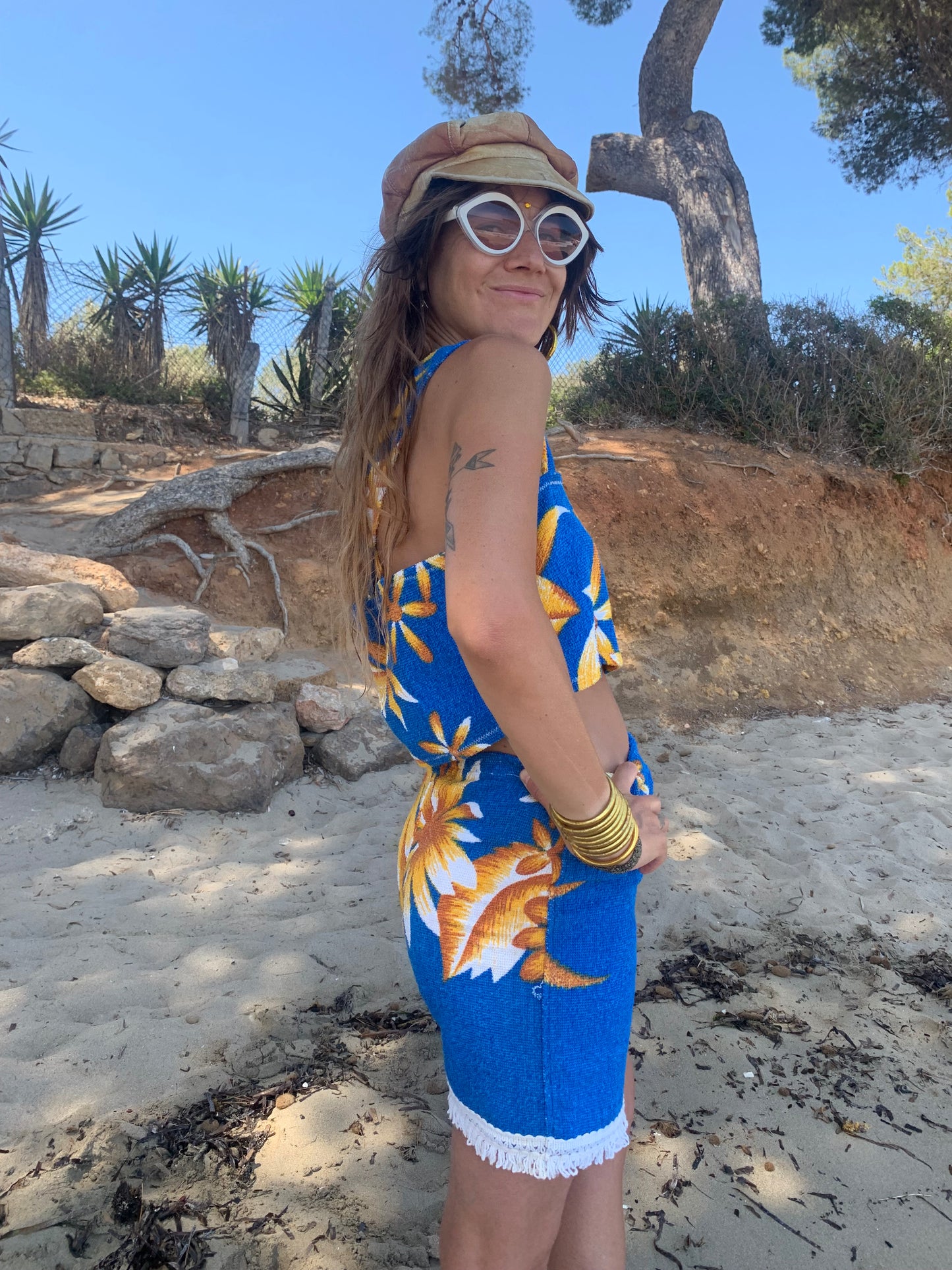 Up-cycled terry towelling shorts only by Vagabond Ibiza bright blue with orange floral detail
