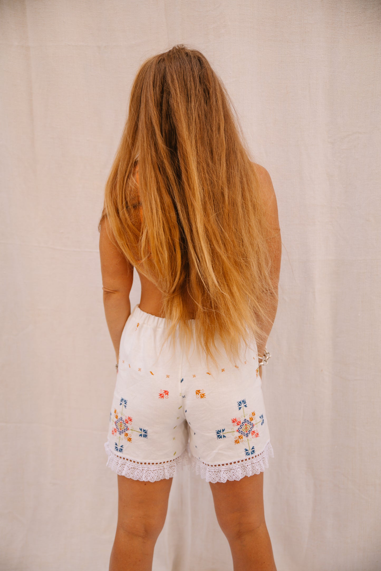 Hand-Embroidered Vintage Linen Shorts with Lace Trim by Vagabond Ibiza