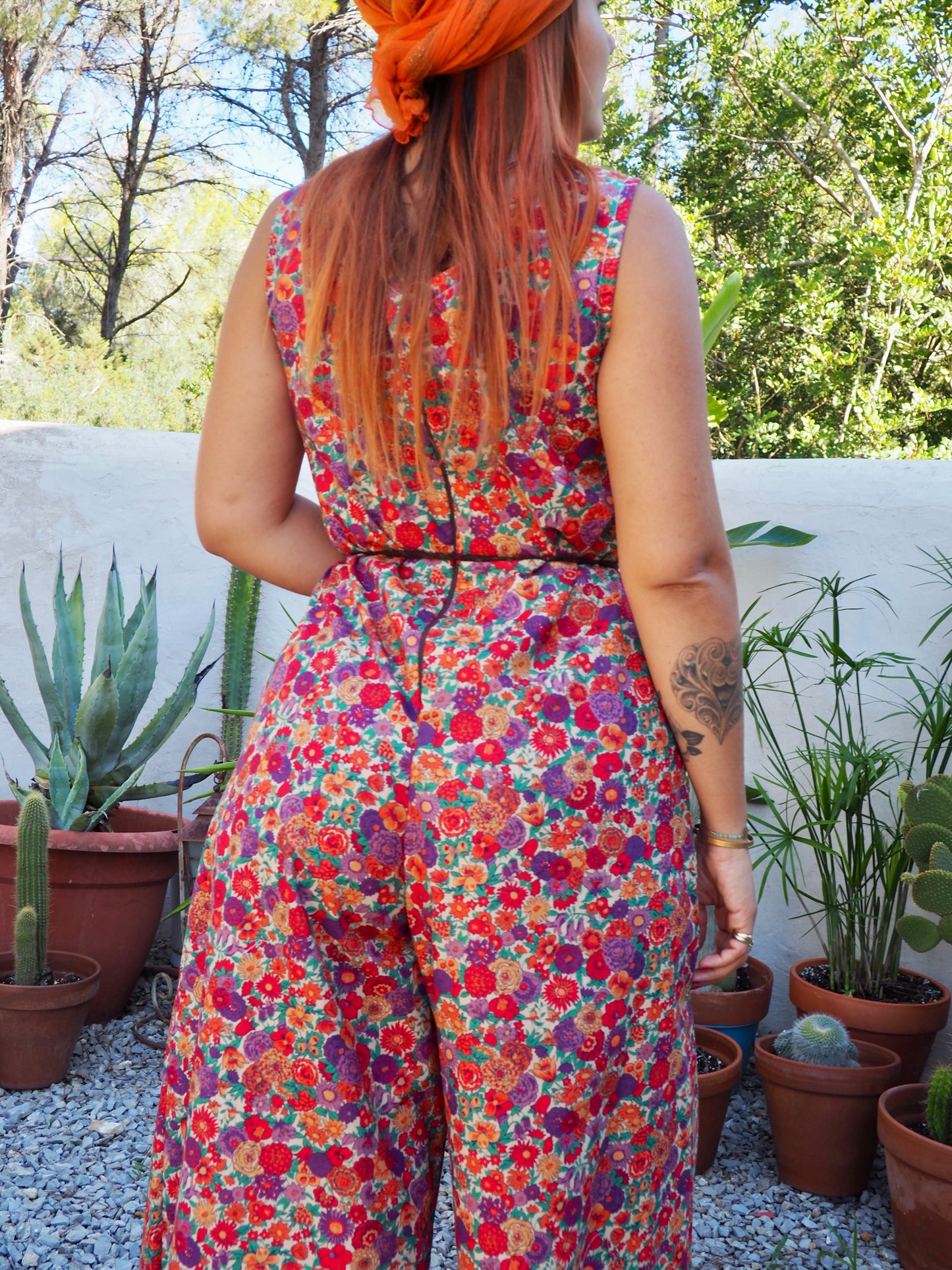 Vintage floral printed jumpsuits with wide leg pants and zip in back for fit up-cycled by Vagabond Ibiza
