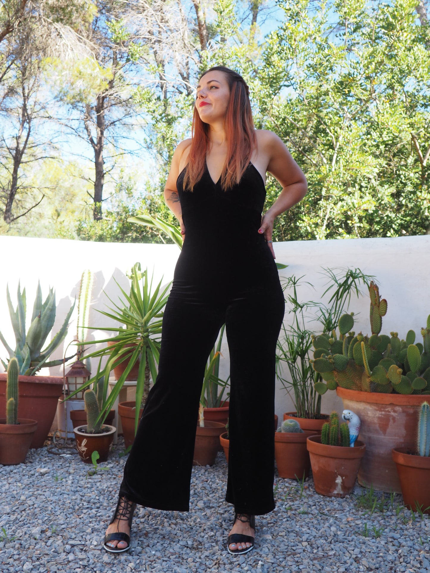 Vintage black thin velvet halter neck jumpsuit with bell bottom flare with stretch