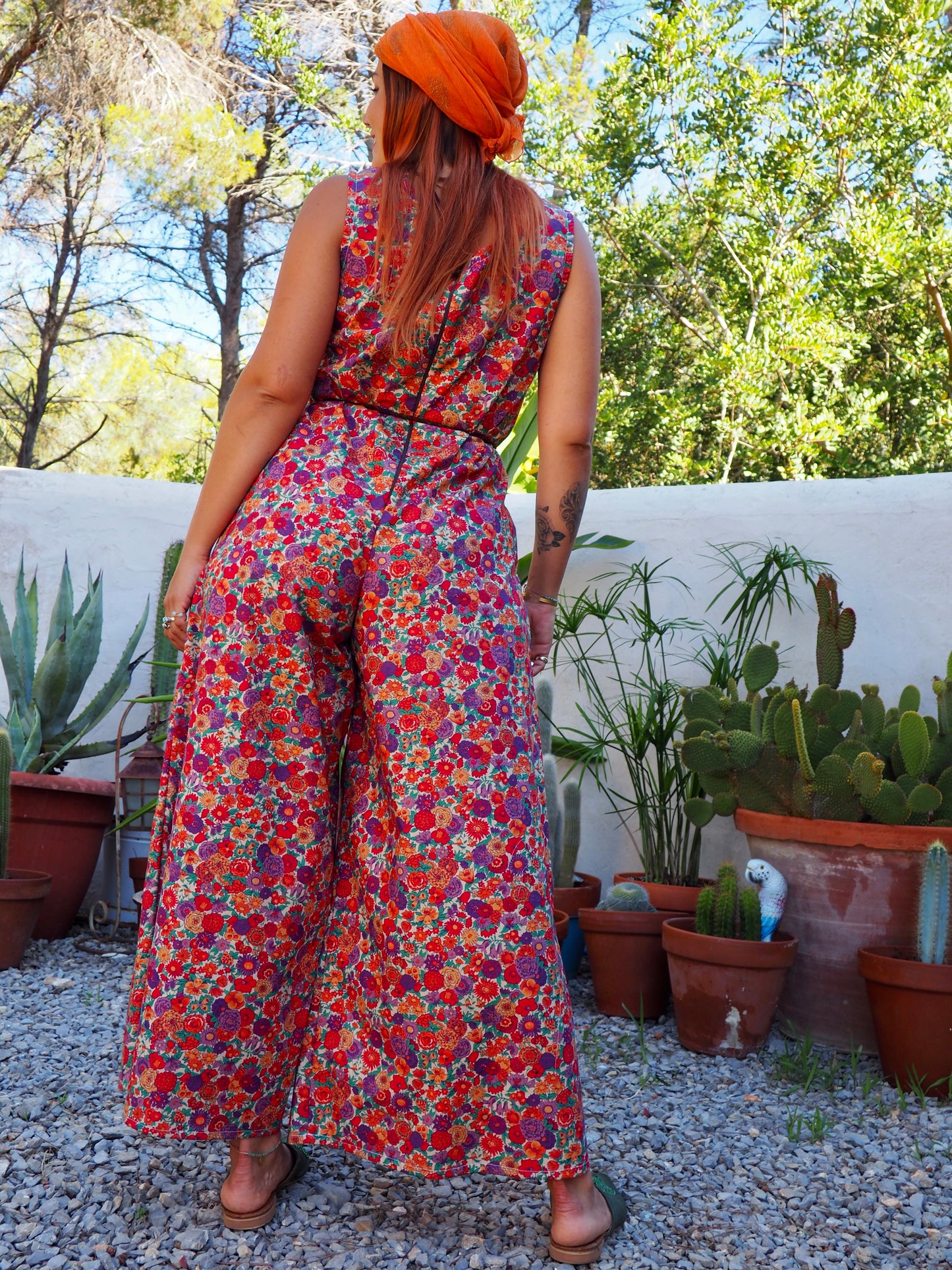 Vintage floral printed jumpsuits with wide leg pants and zip in back for fit up-cycled by Vagabond Ibiza