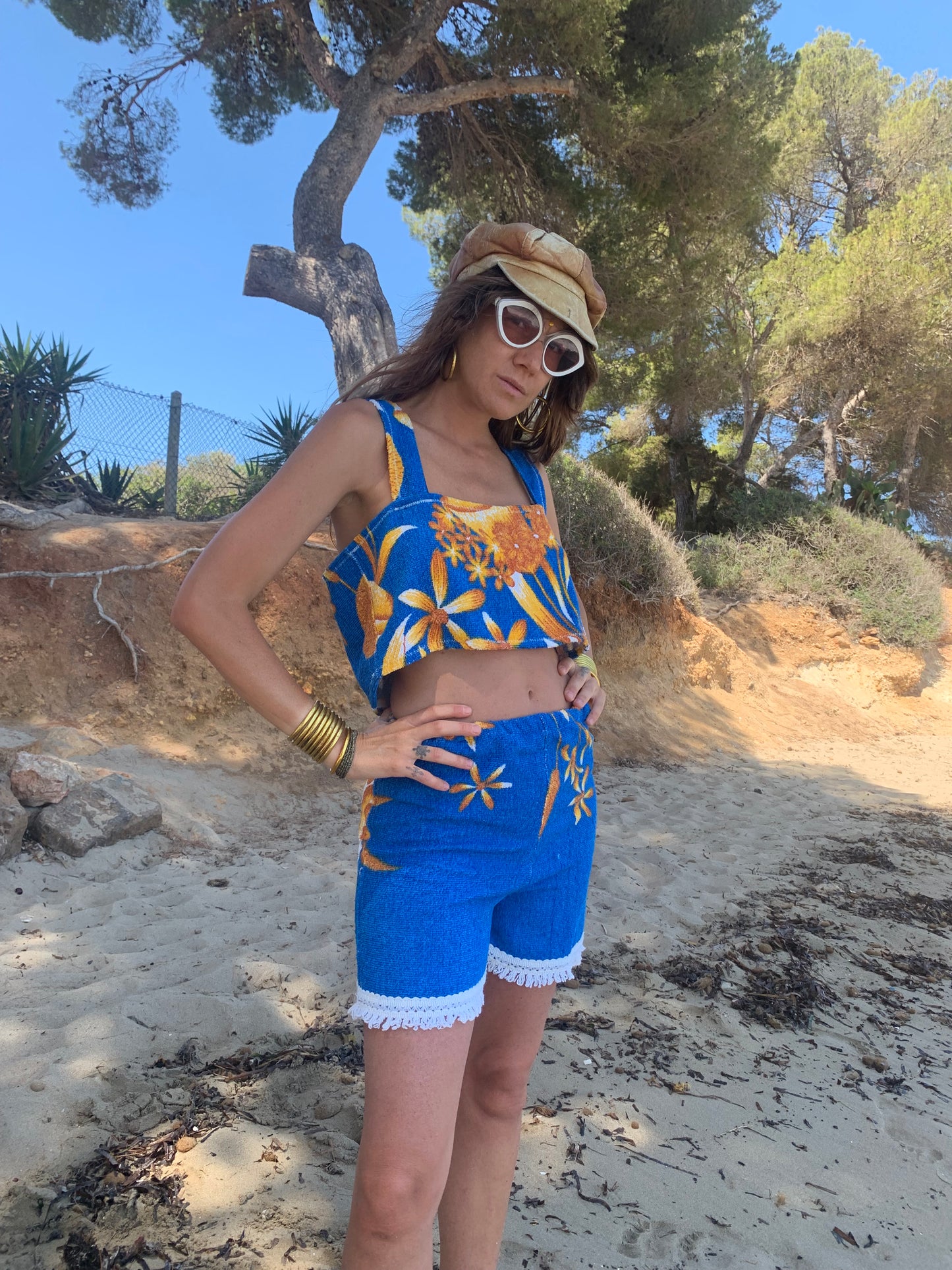 Up-cycled terry towelling shorts only by Vagabond Ibiza bright blue with orange floral detail