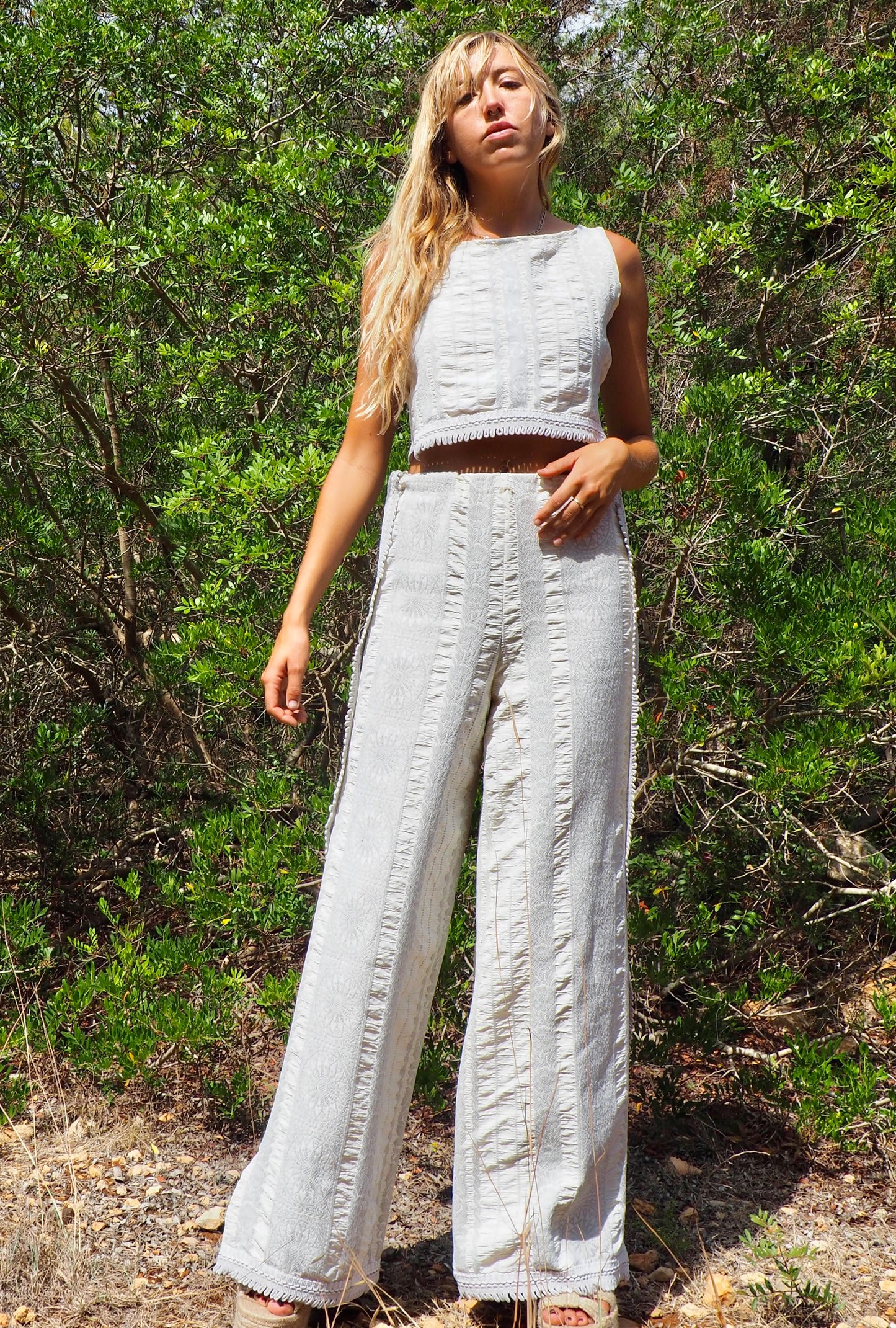 Up-cycled heavy cream and gray cotton woven textile wide leg pants with elastics and waist and side split details made by Vagabond Ibiza