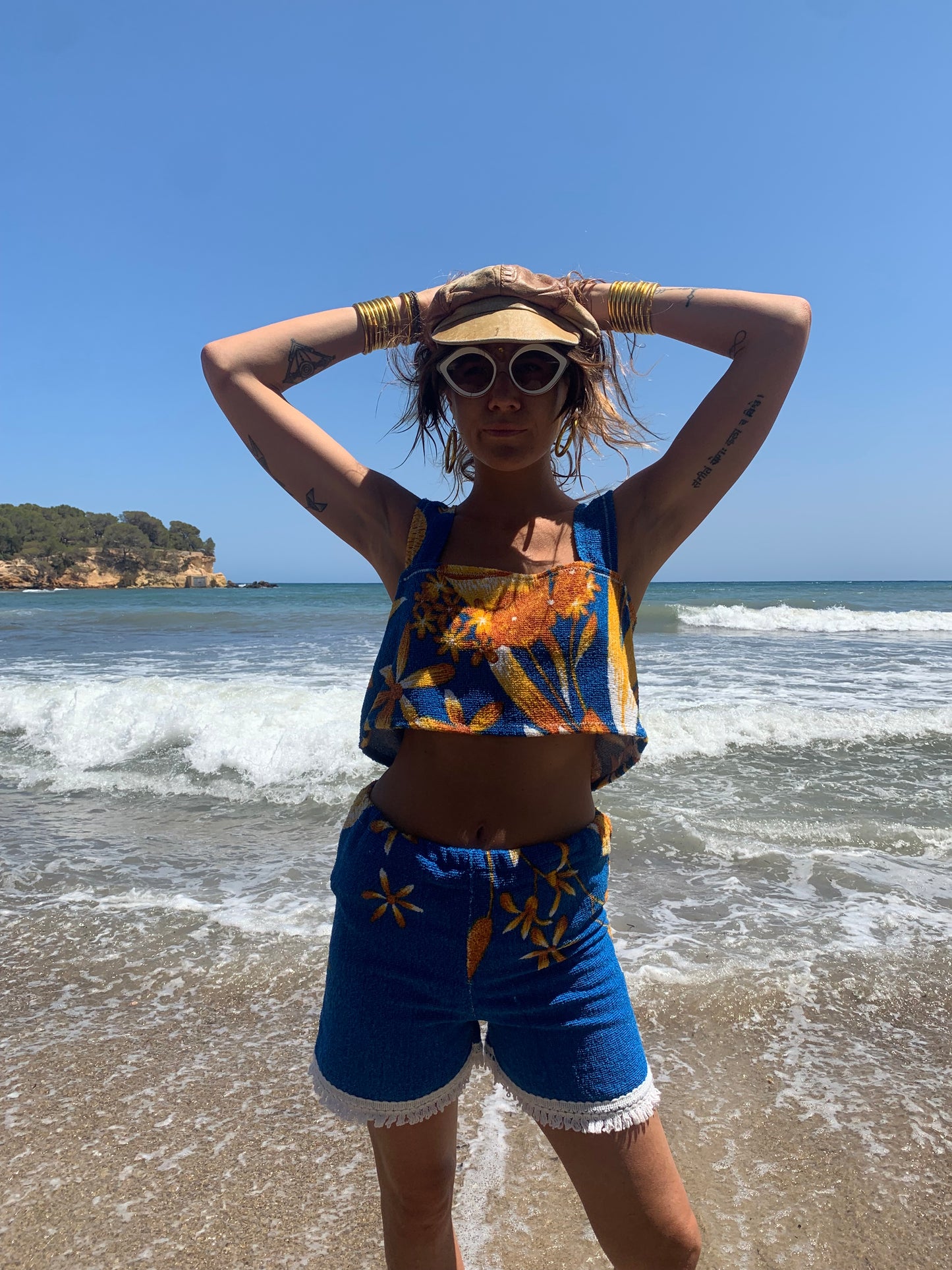 Up-cycled terry towelling shorts only by Vagabond Ibiza bright blue with orange floral detail