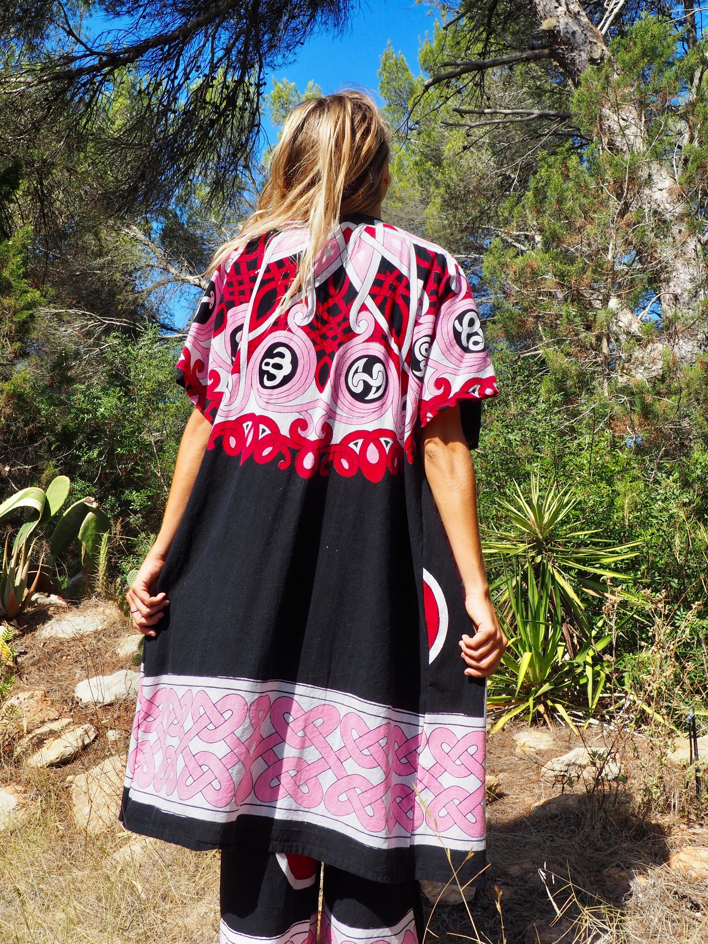 Up-cycled cotton short sleeve kimono jacket in pink and black with vibrant print design and circular motifs by Vagabond Ibiza