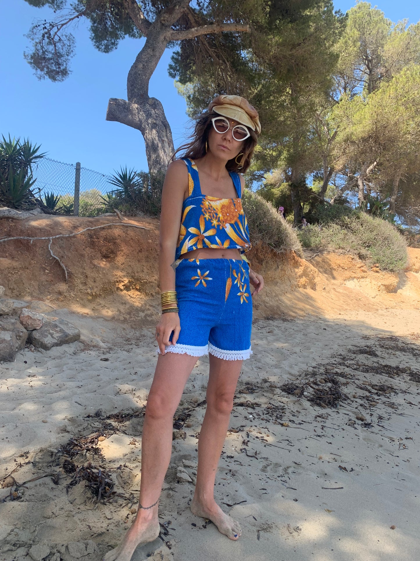 Up-cycled terry towelling shorts only by Vagabond Ibiza bright blue with orange floral detail