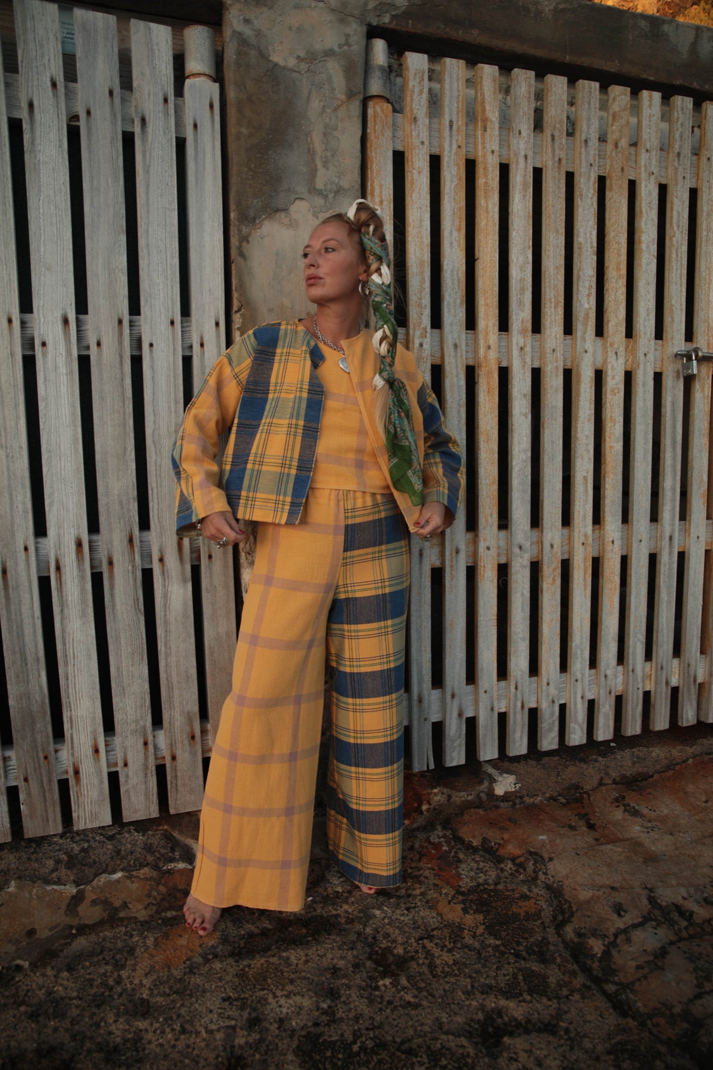 Up-cycled vintage cotton short jackets only from vintage textiles patch together with a yellow and blue checked design.