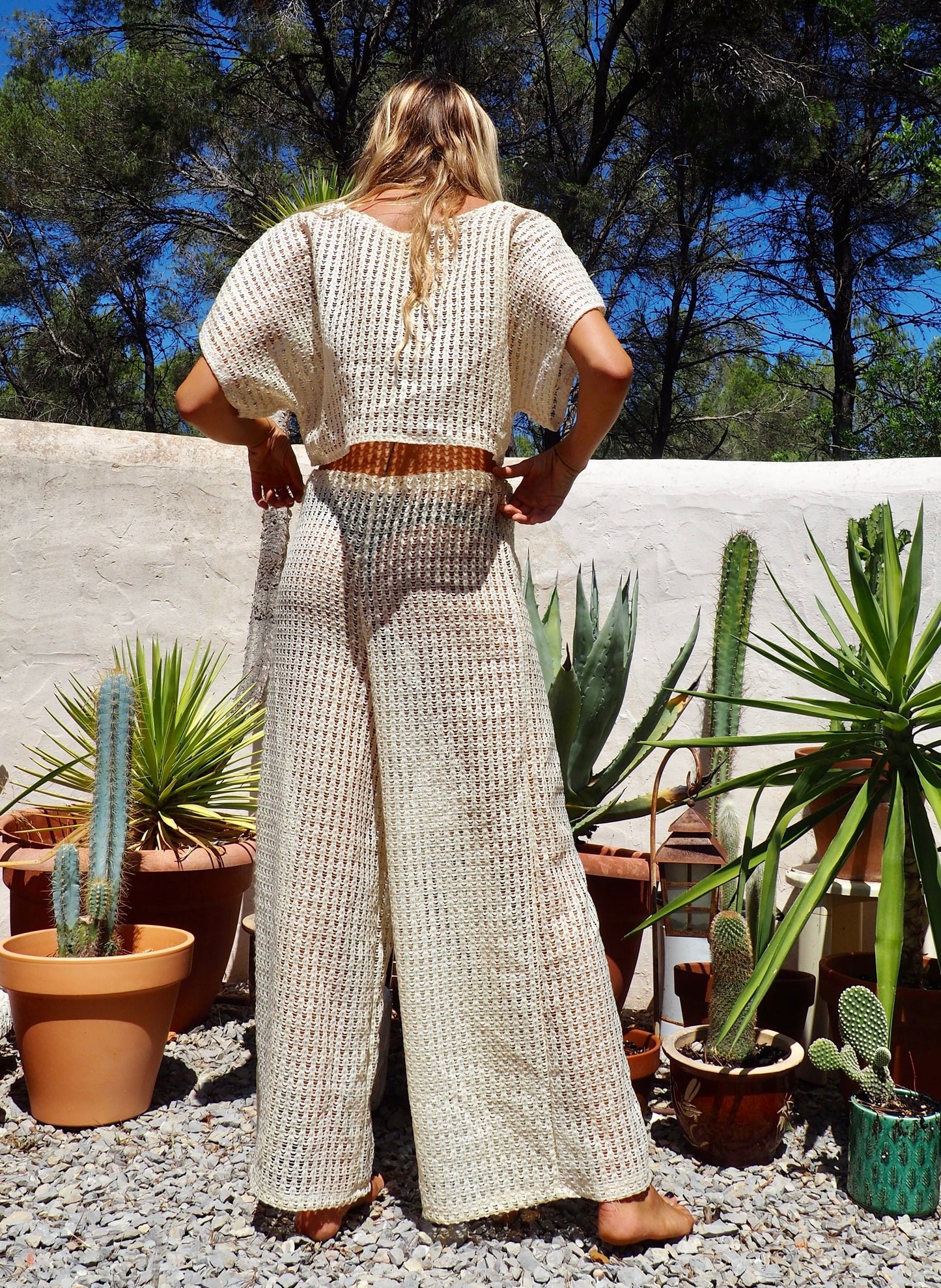 Up-cycled cream mesh woven shear wide leg pants made by Vagabond Ibiza