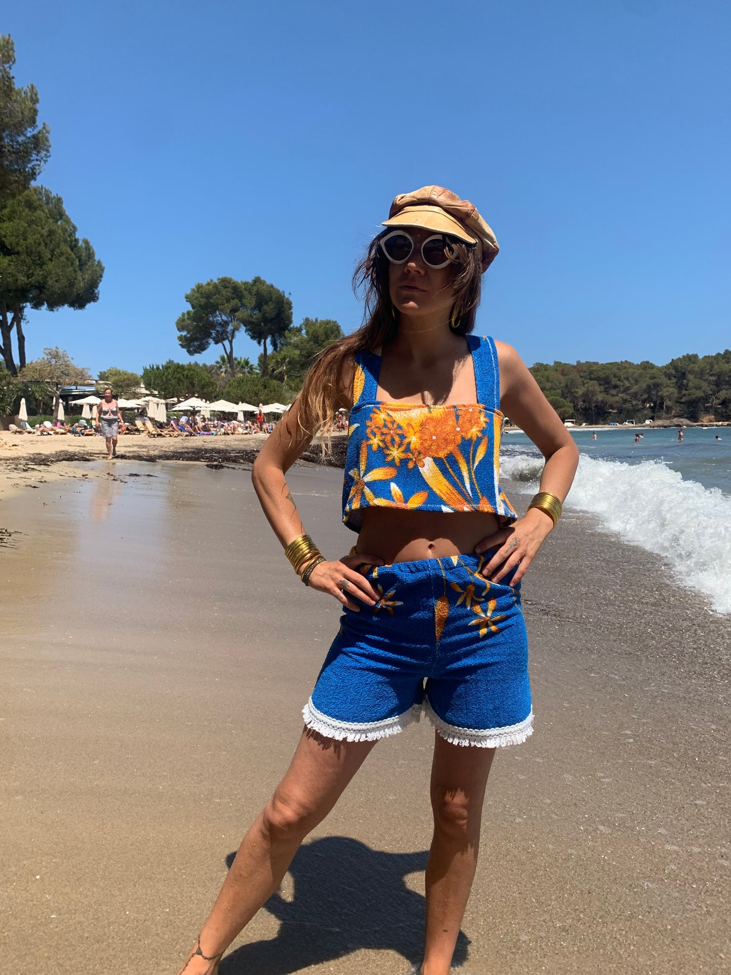 Up-cycled terry towelling shorts only by Vagabond Ibiza bright blue with orange floral detail