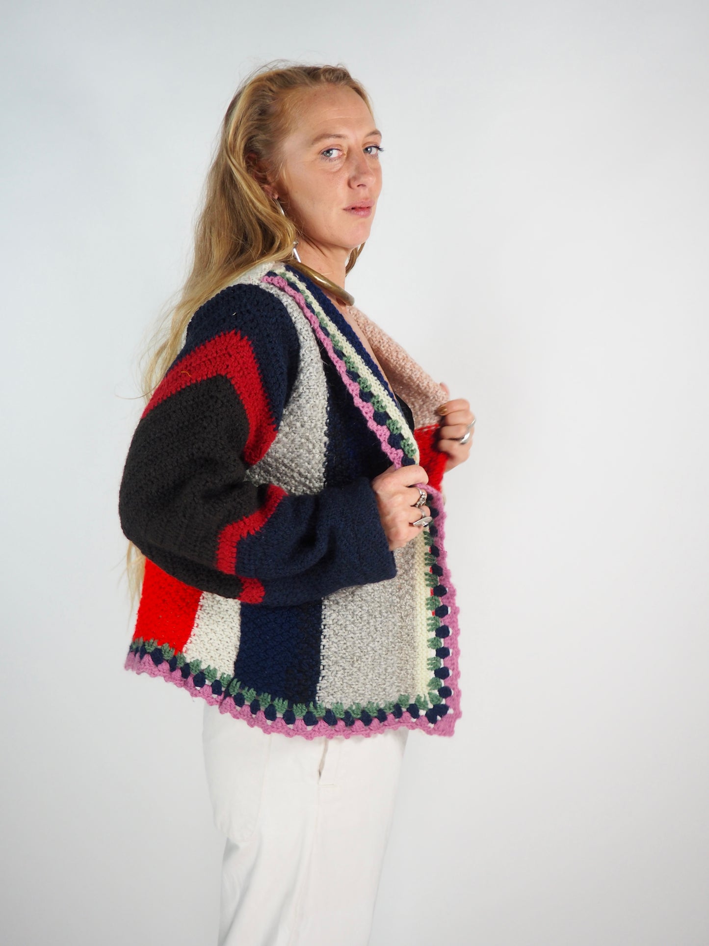 This one-of-a-kind vintage jacket is a true statement piece, crafted from a mix of cotton and wool crochet