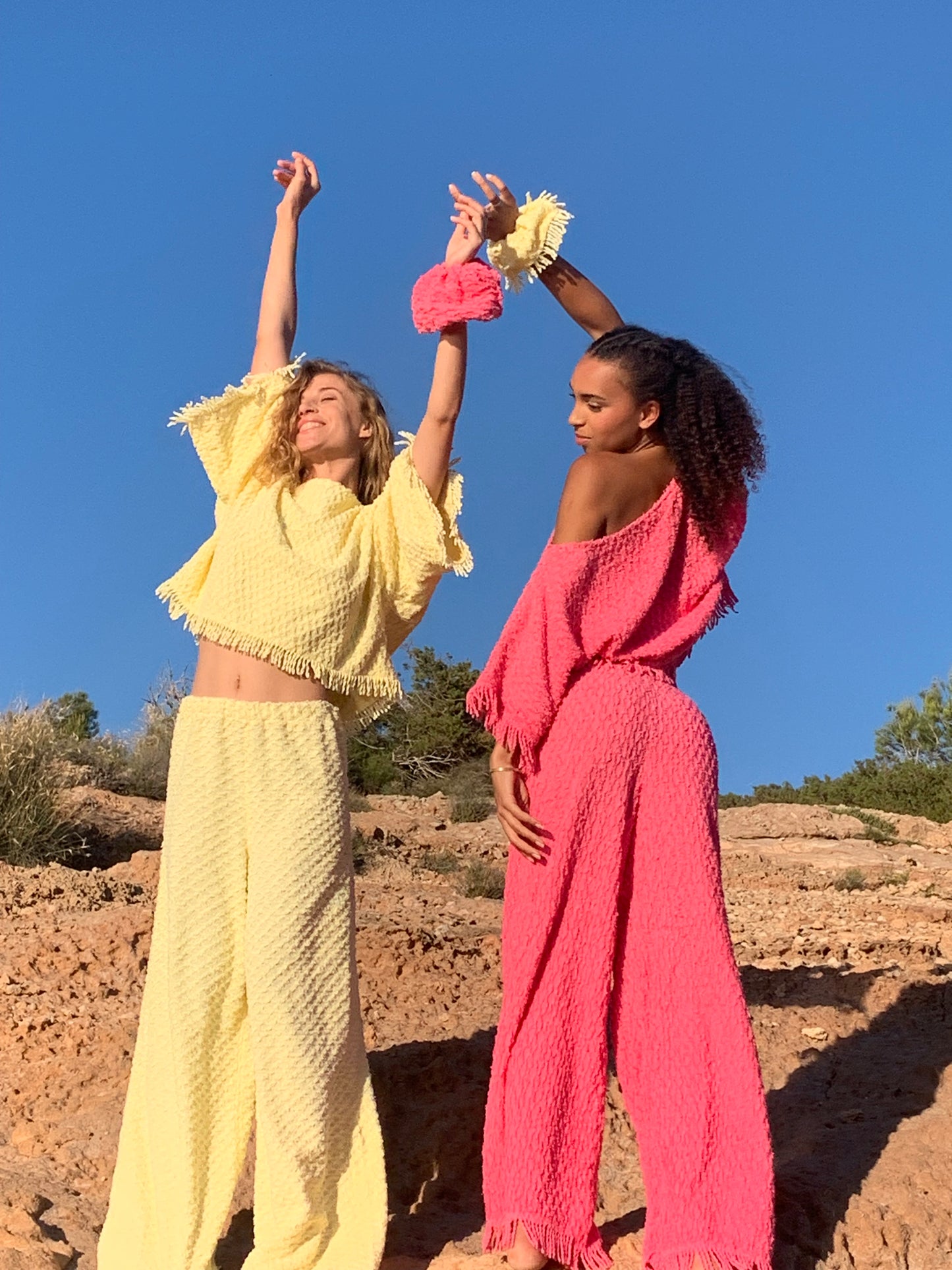 Upcycled bright yellow vintage cotton towel two-piece set with long sleeve top and wide-leg trousers.