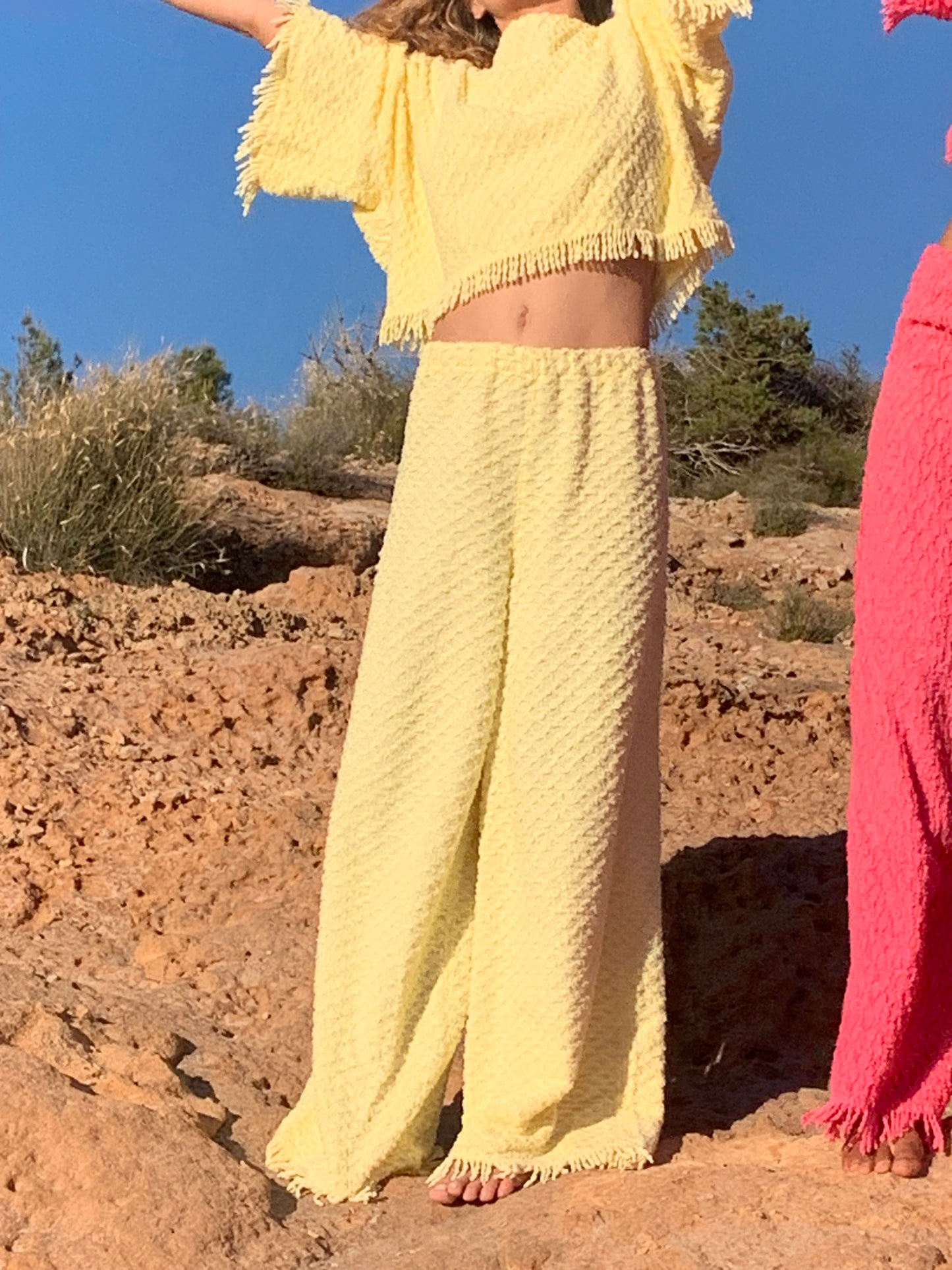 Upcycled bright yellow vintage cotton towel two-piece set with long sleeve top and wide-leg trousers.