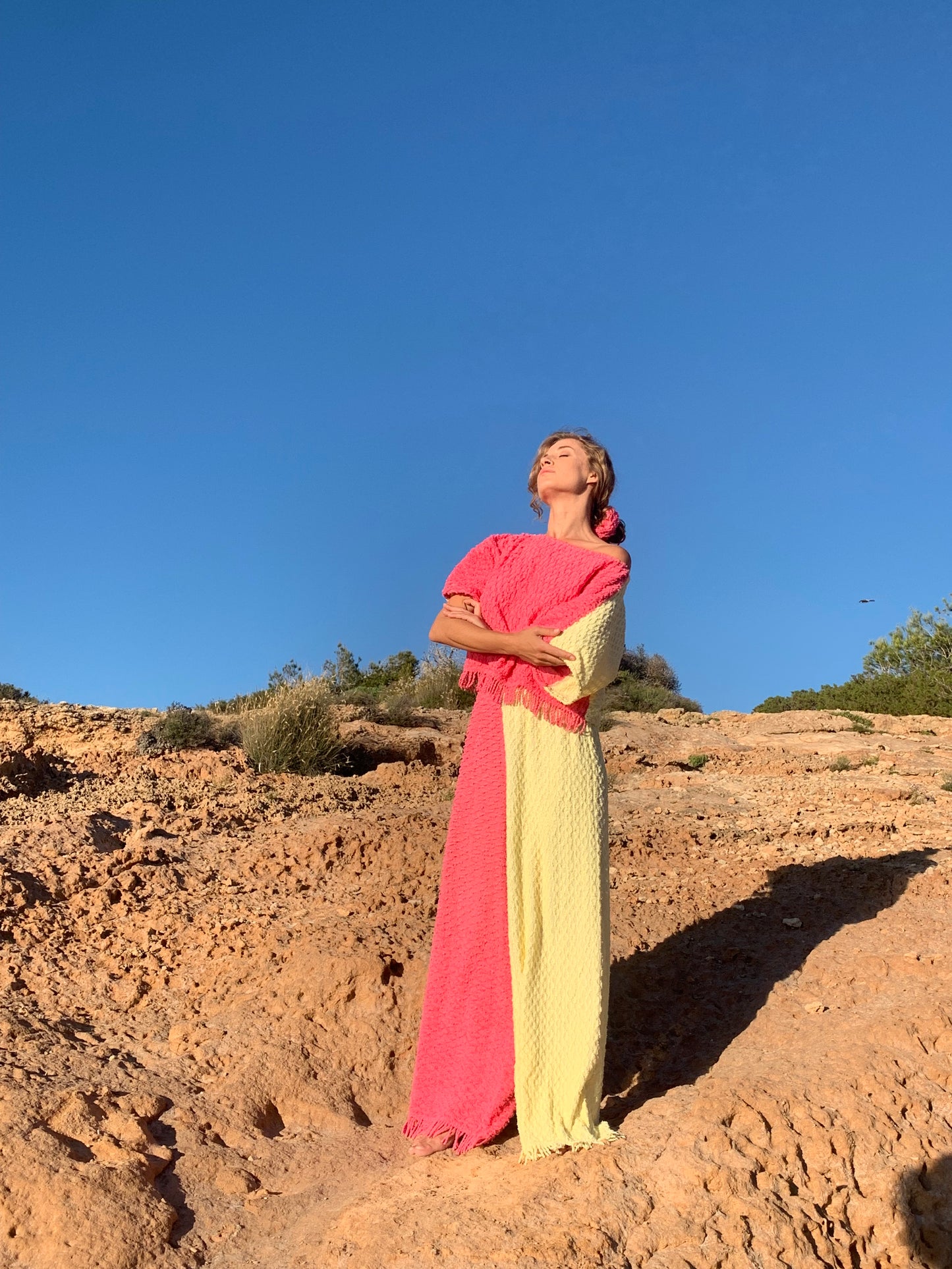 Handmade pastel patchwork towel set in pink and yellow, featuring long sleeve top and wide-leg trousers, upcycled in Ibiza.