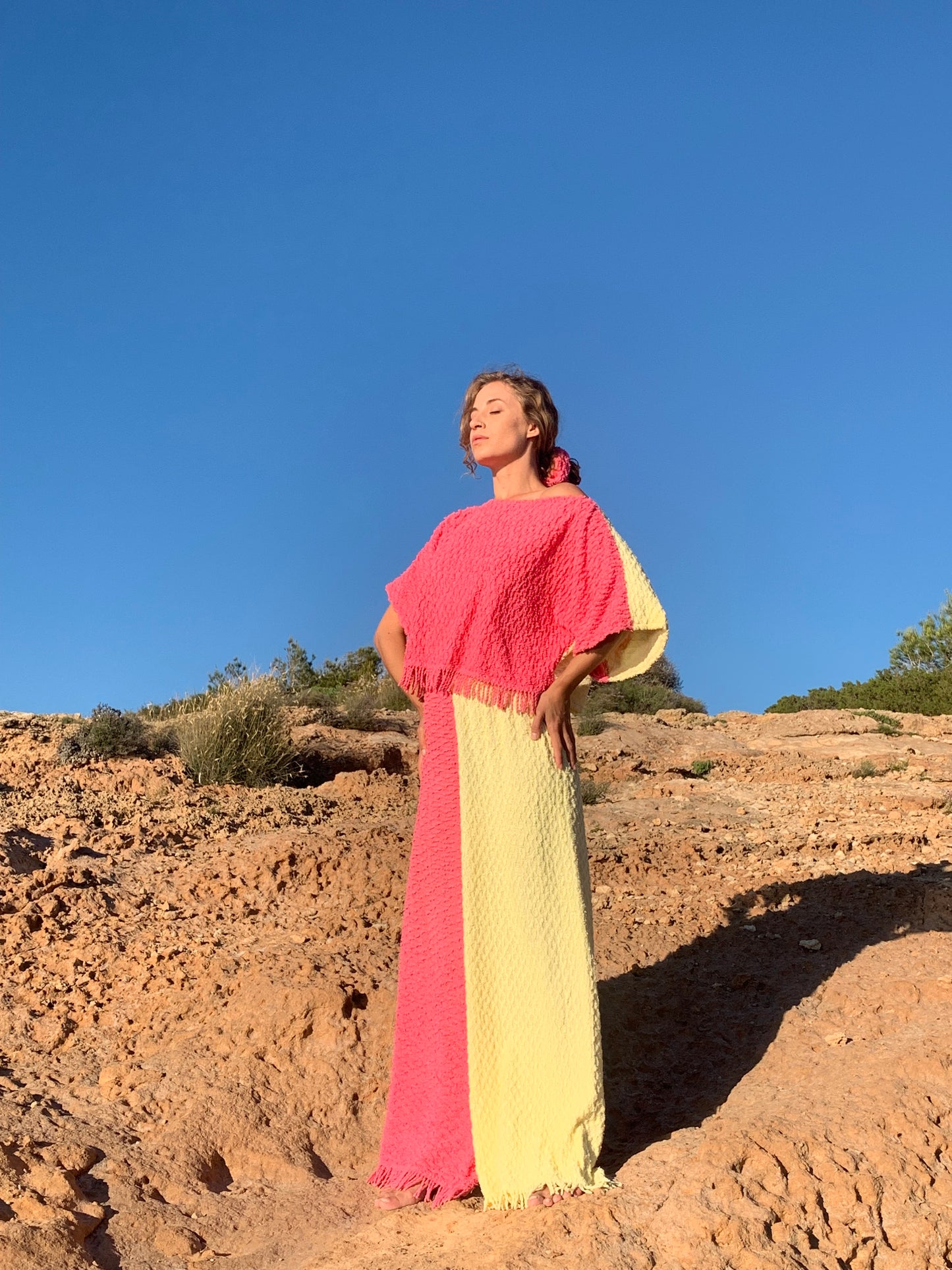 Handmade pastel patchwork towel set in pink and yellow, featuring long sleeve top and wide-leg trousers, upcycled in Ibiza.