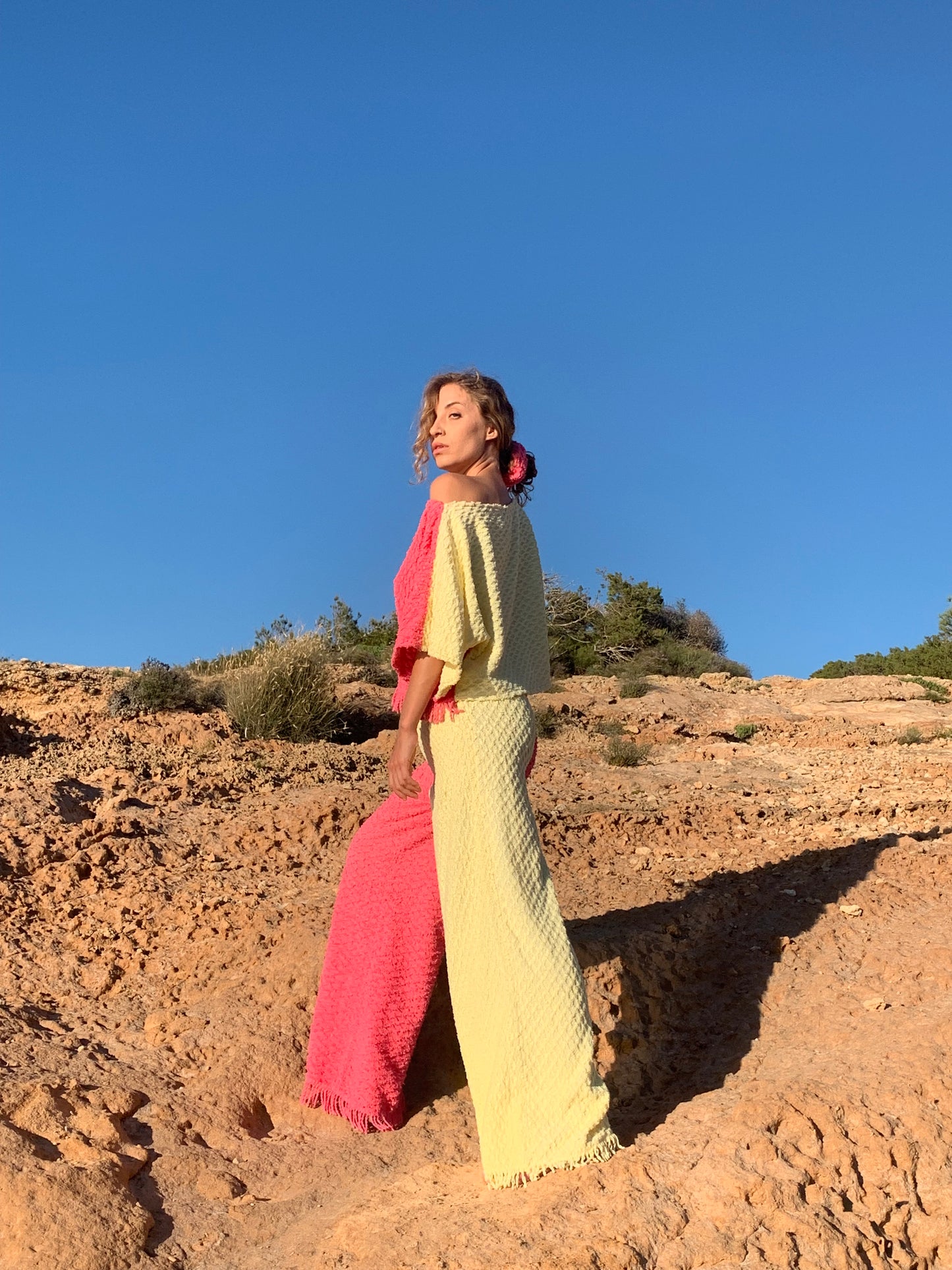 Handmade pastel patchwork towel set in pink and yellow, featuring long sleeve top and wide-leg trousers, upcycled in Ibiza.