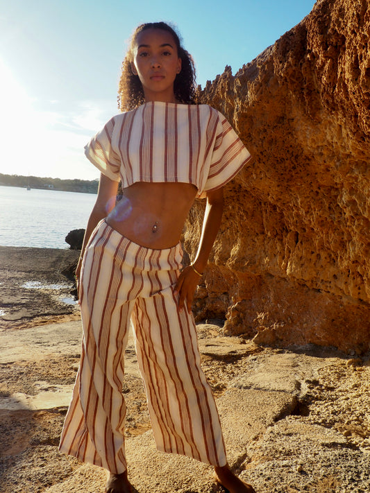Sustainable two-piece set in striped vintage linen with oversized short sleeve top and wide-leg trousers, handmade in Ibiza.
