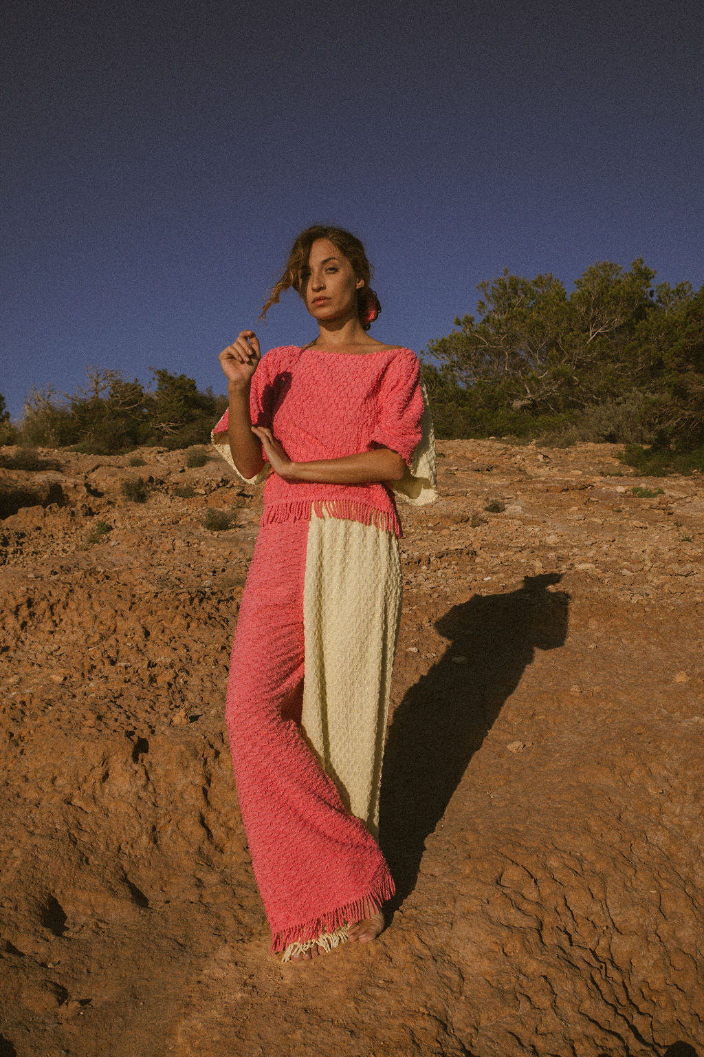 Handmade pastel patchwork towel set in pink and yellow, featuring long sleeve top and wide-leg trousers, upcycled in Ibiza.