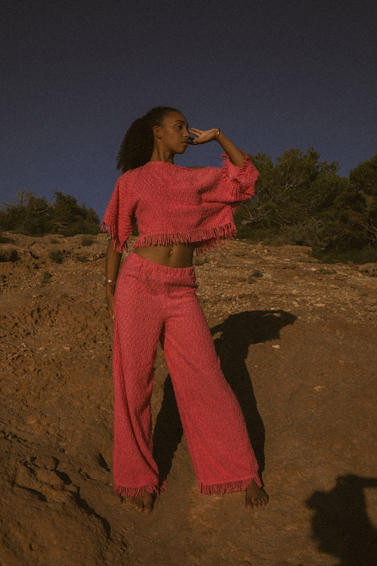 Upcycled pastel pink cotton towel set with long-sleeve oversized top and wide-leg trousers, handmade in Ibiza.
