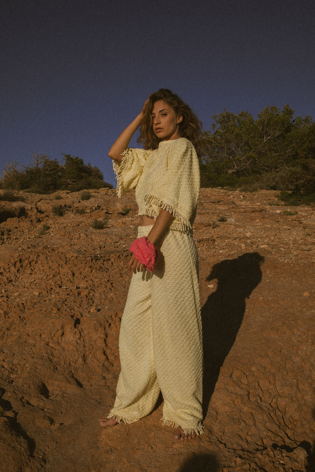 Upcycled bright yellow vintage cotton towel two-piece set with long sleeve top and wide-leg trousers.