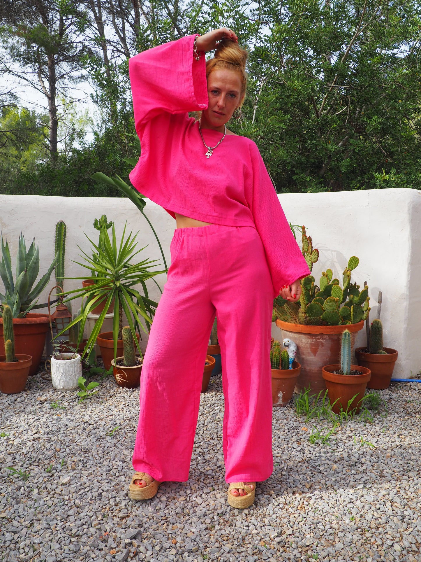 Bright bright pink elasticated waist wide leg pants made by Vagabond Ibiza top is now sold