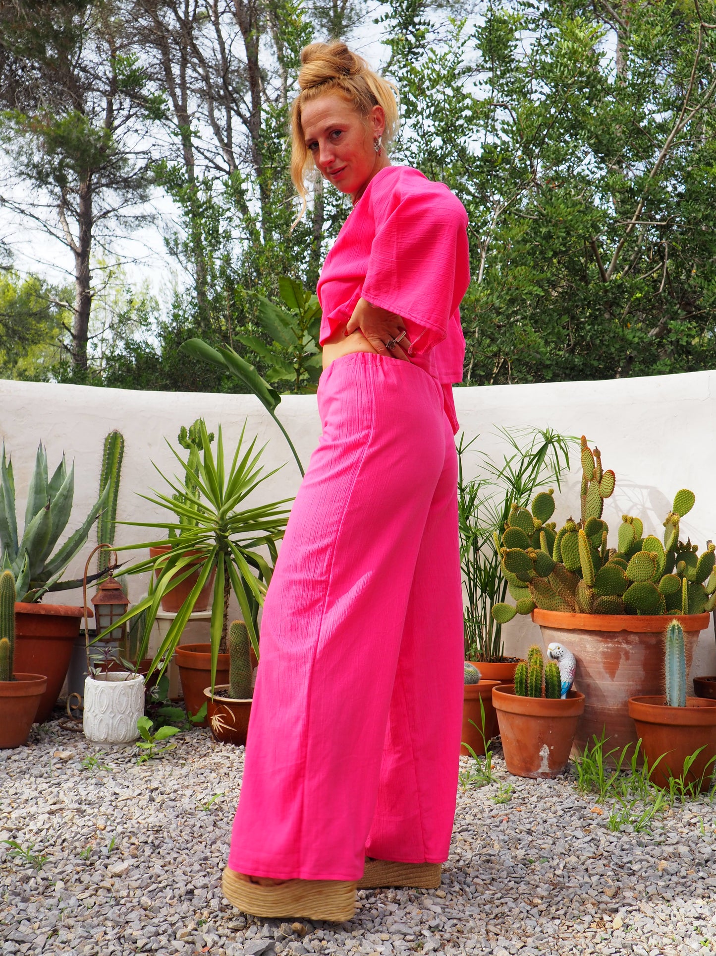 Bright bright pink elasticated waist wide leg pants made by Vagabond Ibiza top is now sold