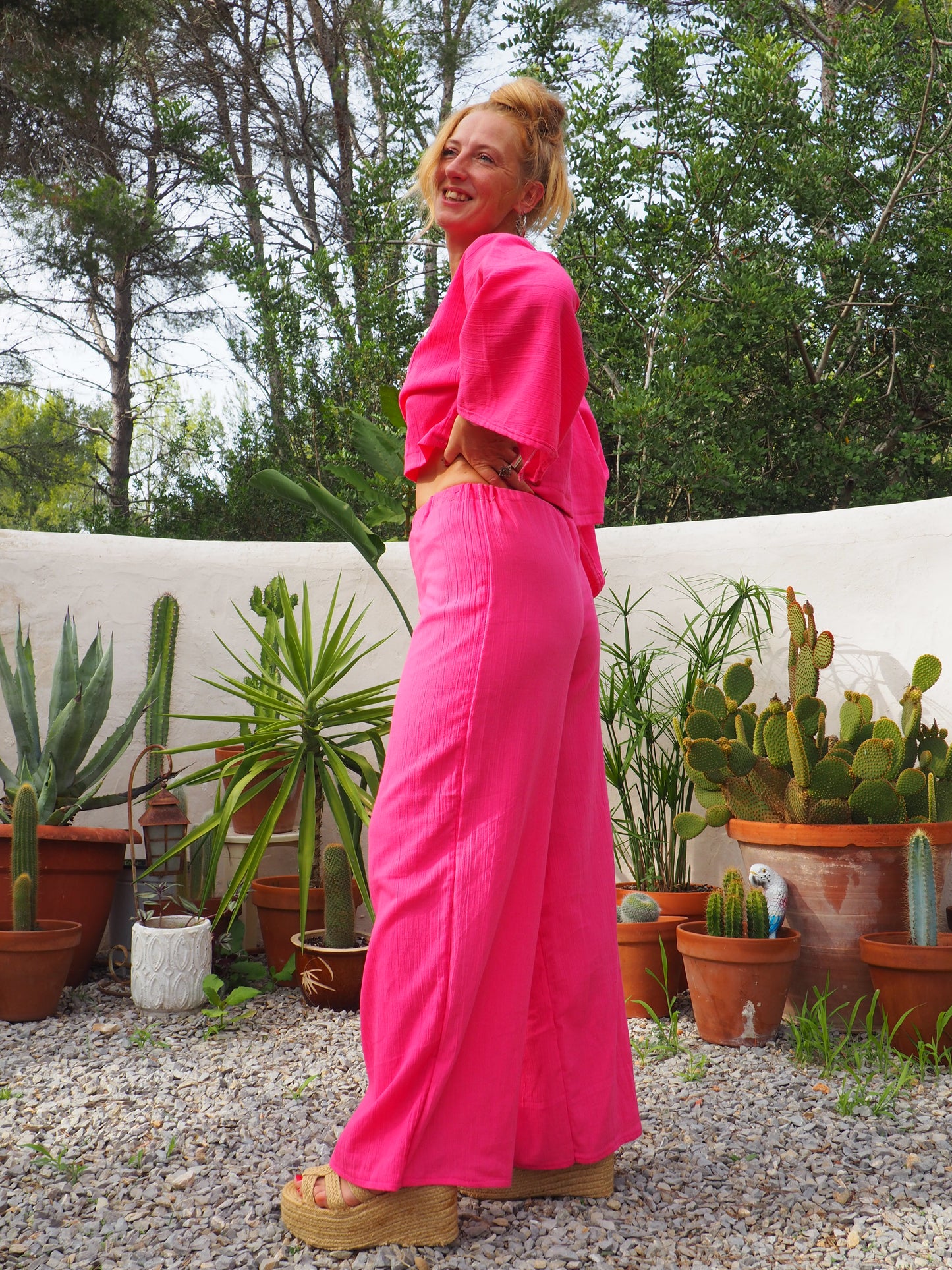 Bright bright pink elasticated waist wide leg pants made by Vagabond Ibiza top is now sold
