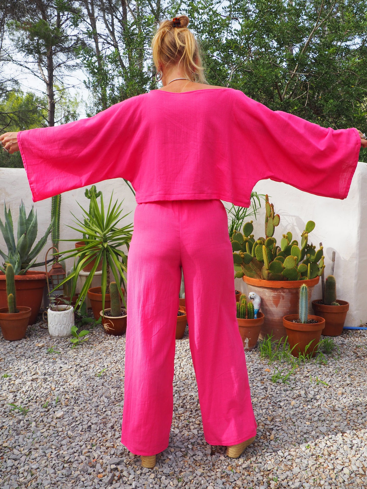 Bright bright pink elasticated waist wide leg pants made by Vagabond Ibiza top is now sold