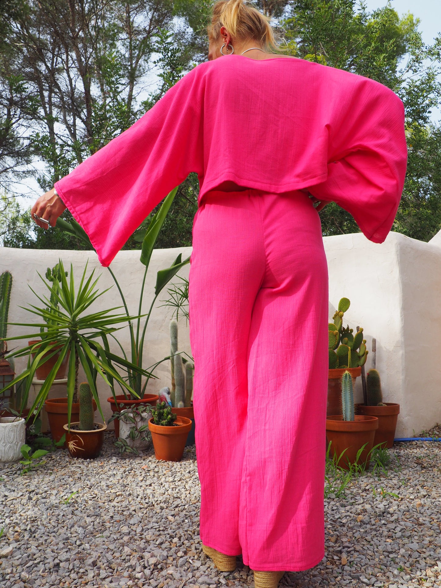 Bright bright pink elasticated waist wide leg pants made by Vagabond Ibiza top is now sold