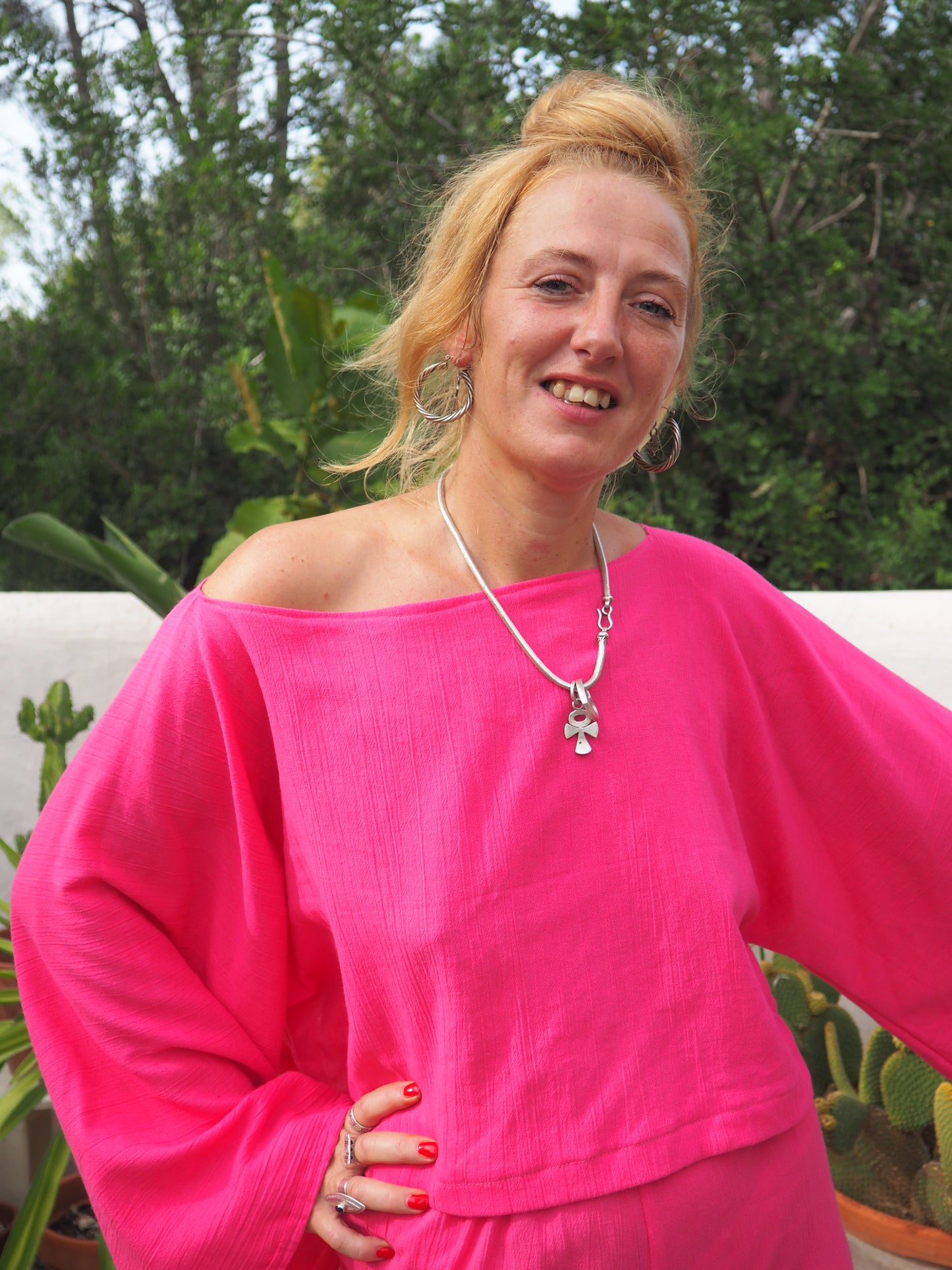 Bright bright pink elasticated waist wide leg pants made by Vagabond Ibiza top is now sold