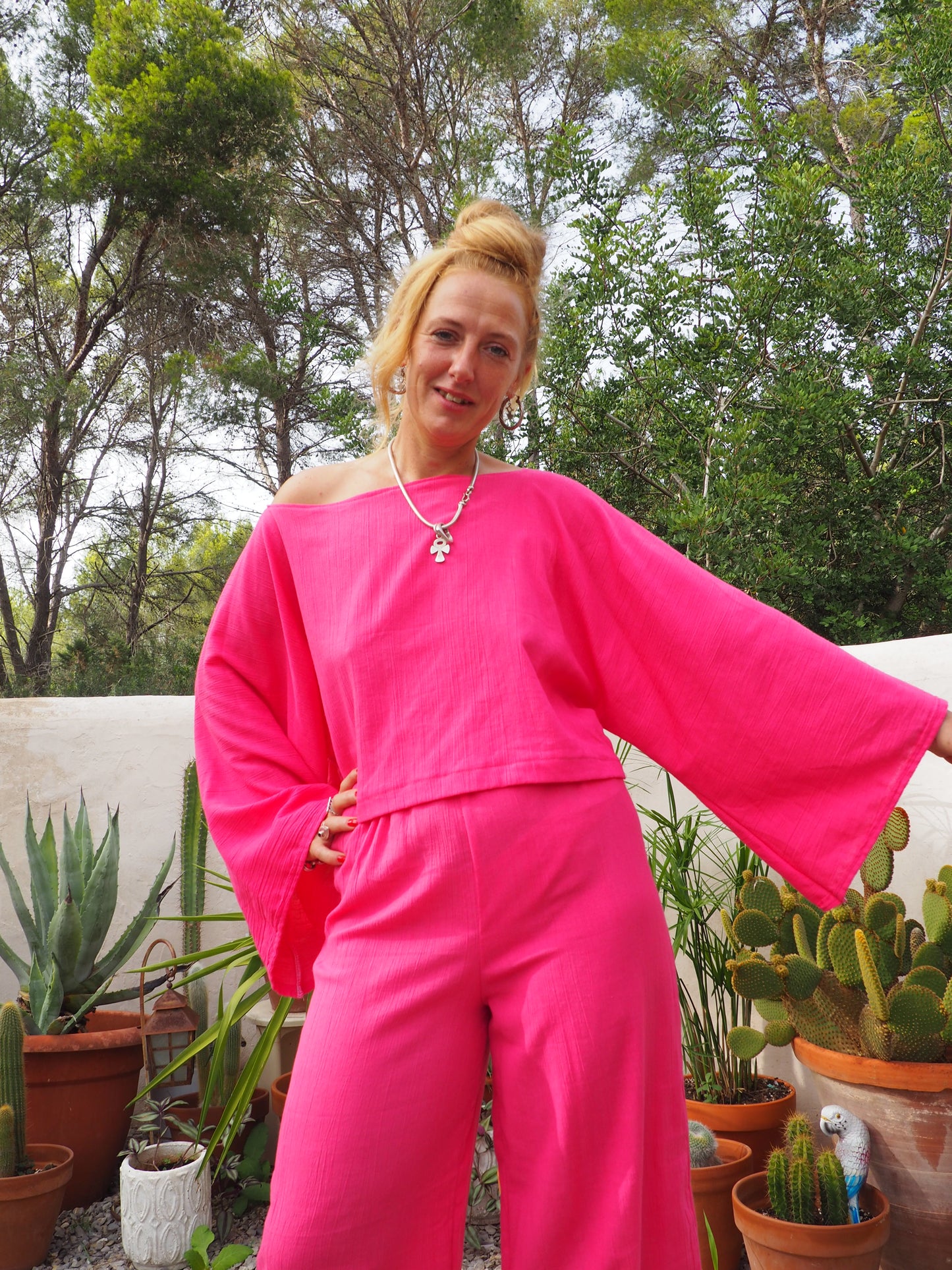 Bright bright pink elasticated waist wide leg pants made by Vagabond Ibiza top is now sold