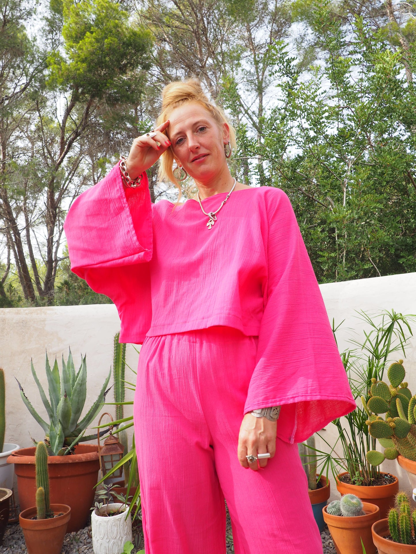 Bright bright pink elasticated waist wide leg pants made by Vagabond Ibiza top is now sold