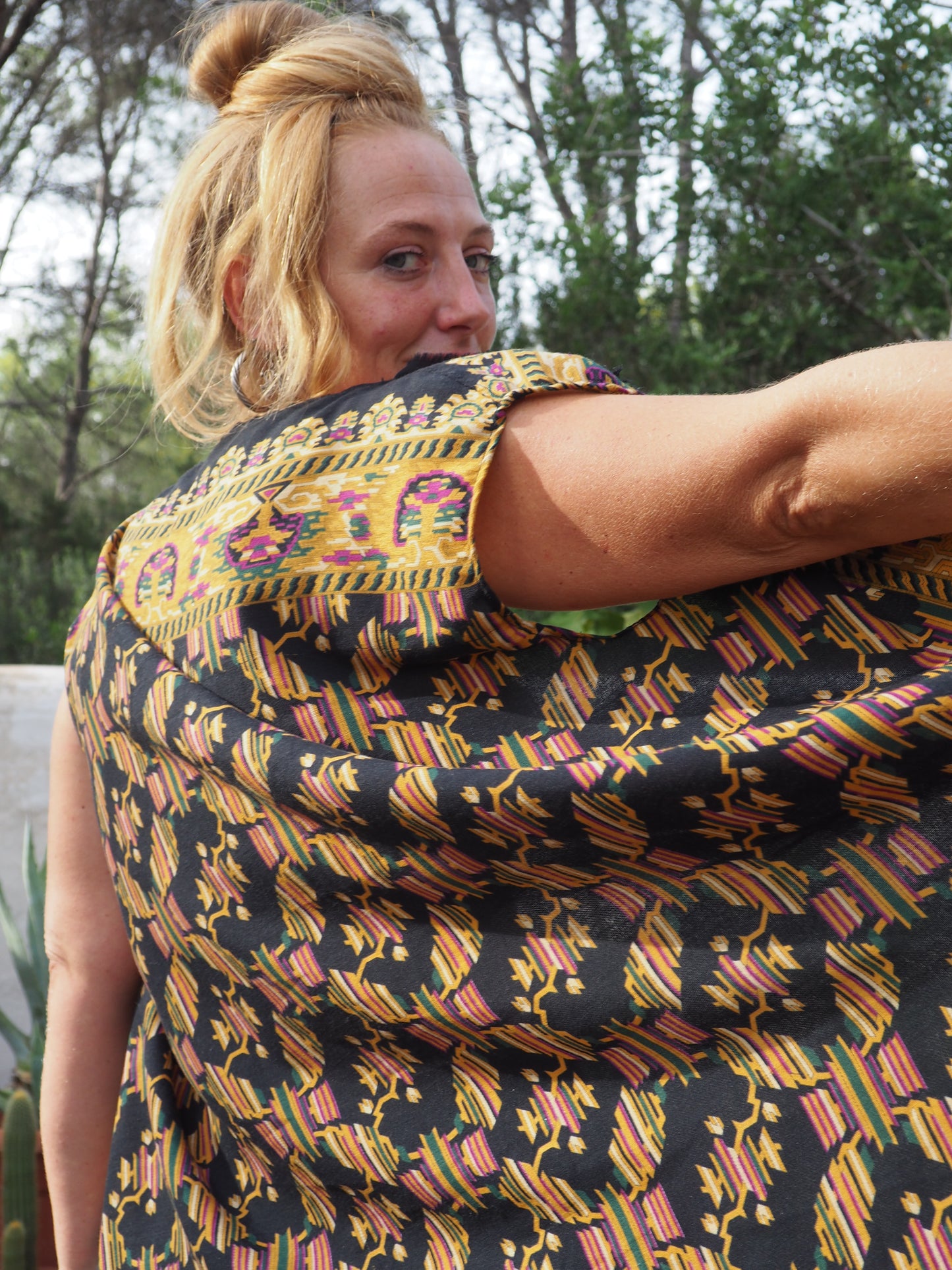 Vintage woven textiles up-cycled long waistcoat with cool print and autumn tones made by Vagabond Ibiza