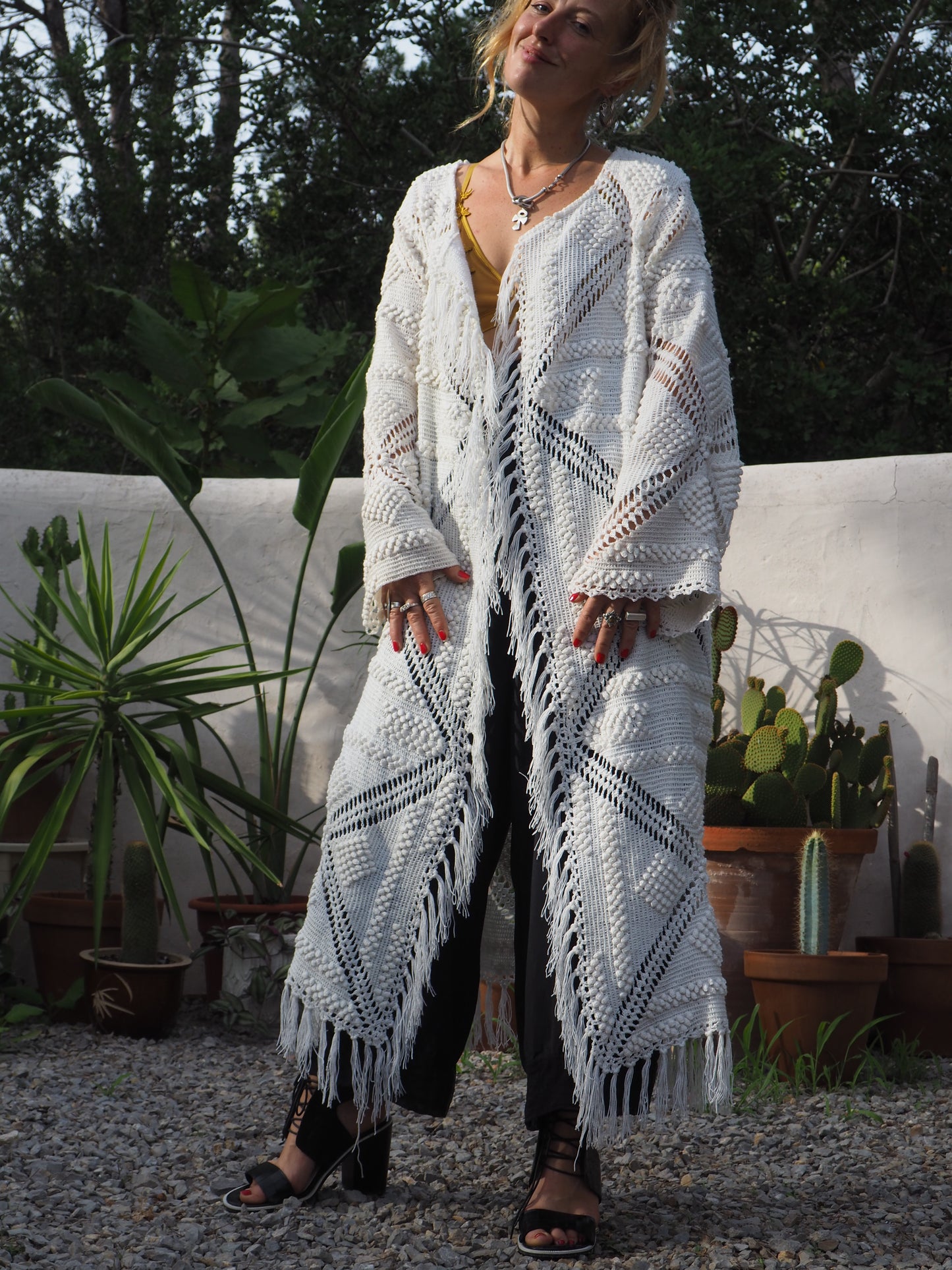 White vintage crochet long jacket up-cycled by Vagabond Ibiza with cute tassel trim.