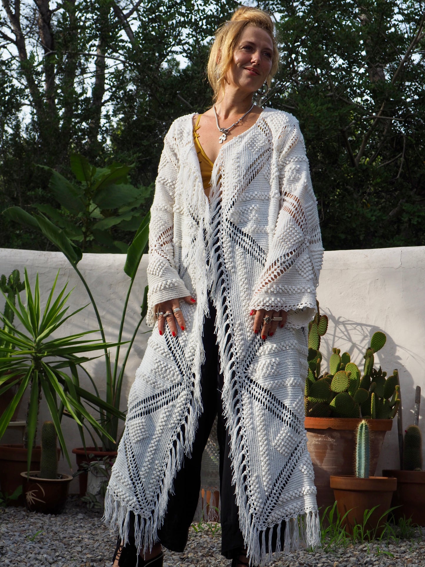 White vintage crochet long jacket up-cycled by Vagabond Ibiza with cute tassel trim.