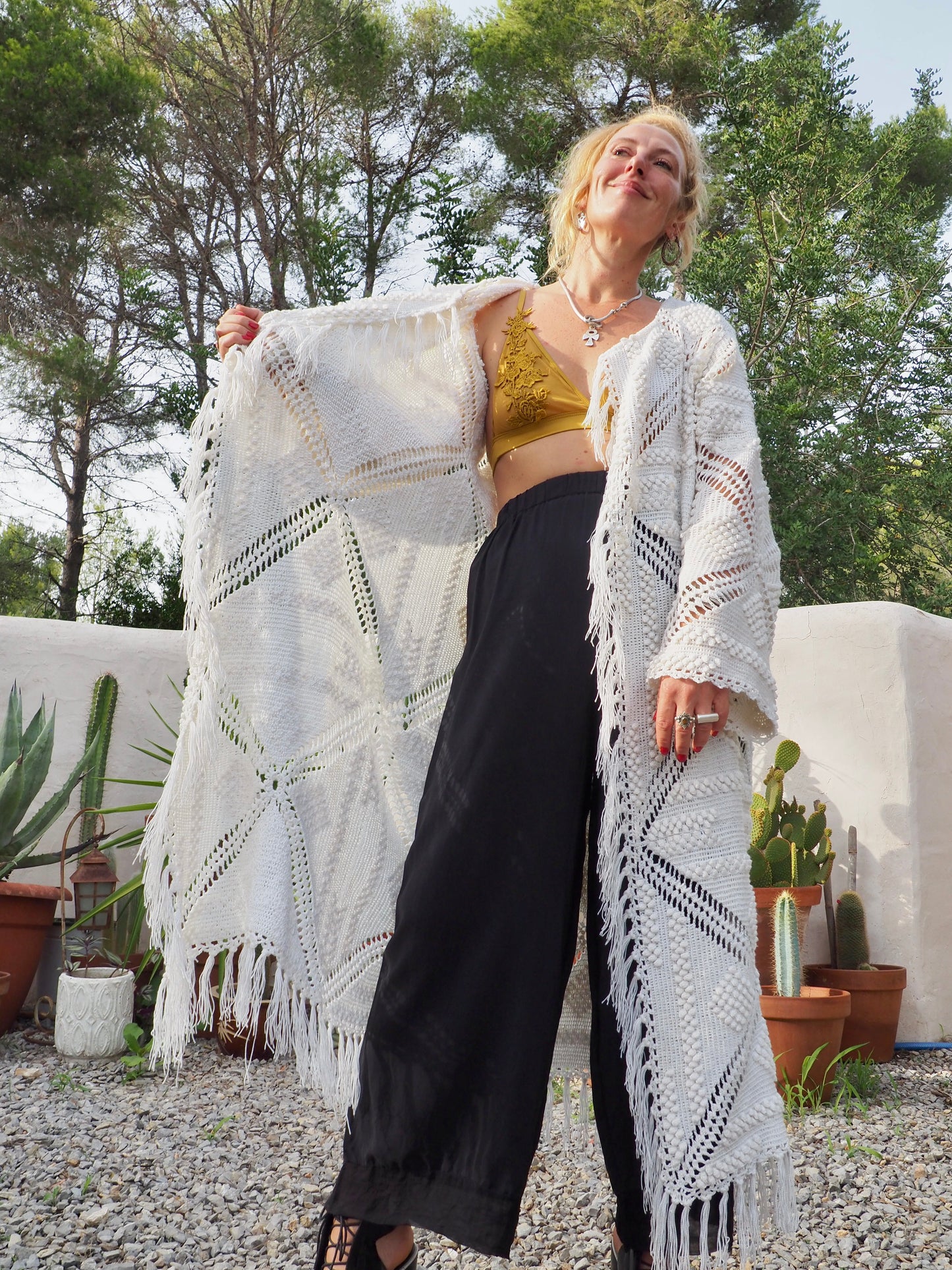 White vintage crochet long jacket up-cycled by Vagabond Ibiza with cute tassel trim.