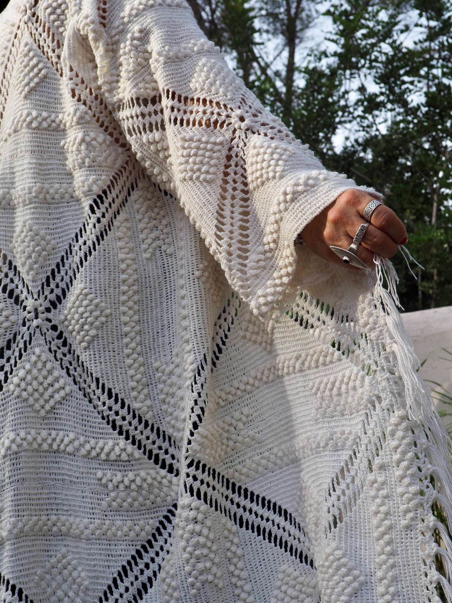 White vintage crochet long jacket up-cycled by Vagabond Ibiza with cute tassel trim.