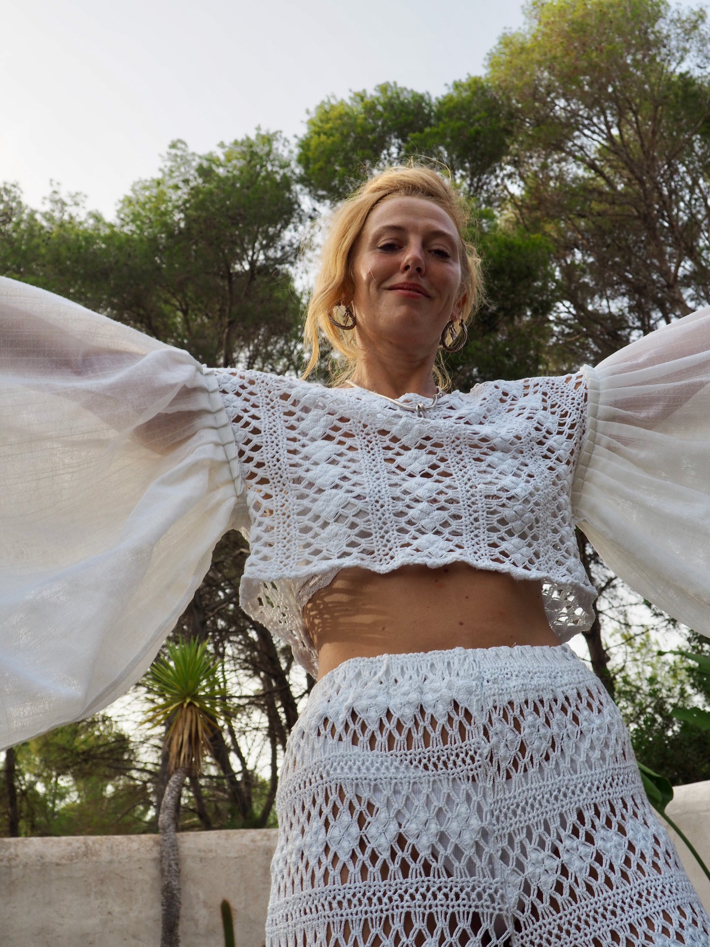 White crochet up-cycled 2 piece set wide leg pants with elastic waist and top up-cycled by Vagabond Ibiza from