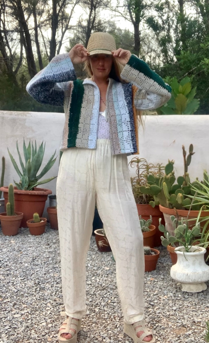 Up-cycled vintage crochet cropped jacket made by Vagabond Ibiza with pastel tones.