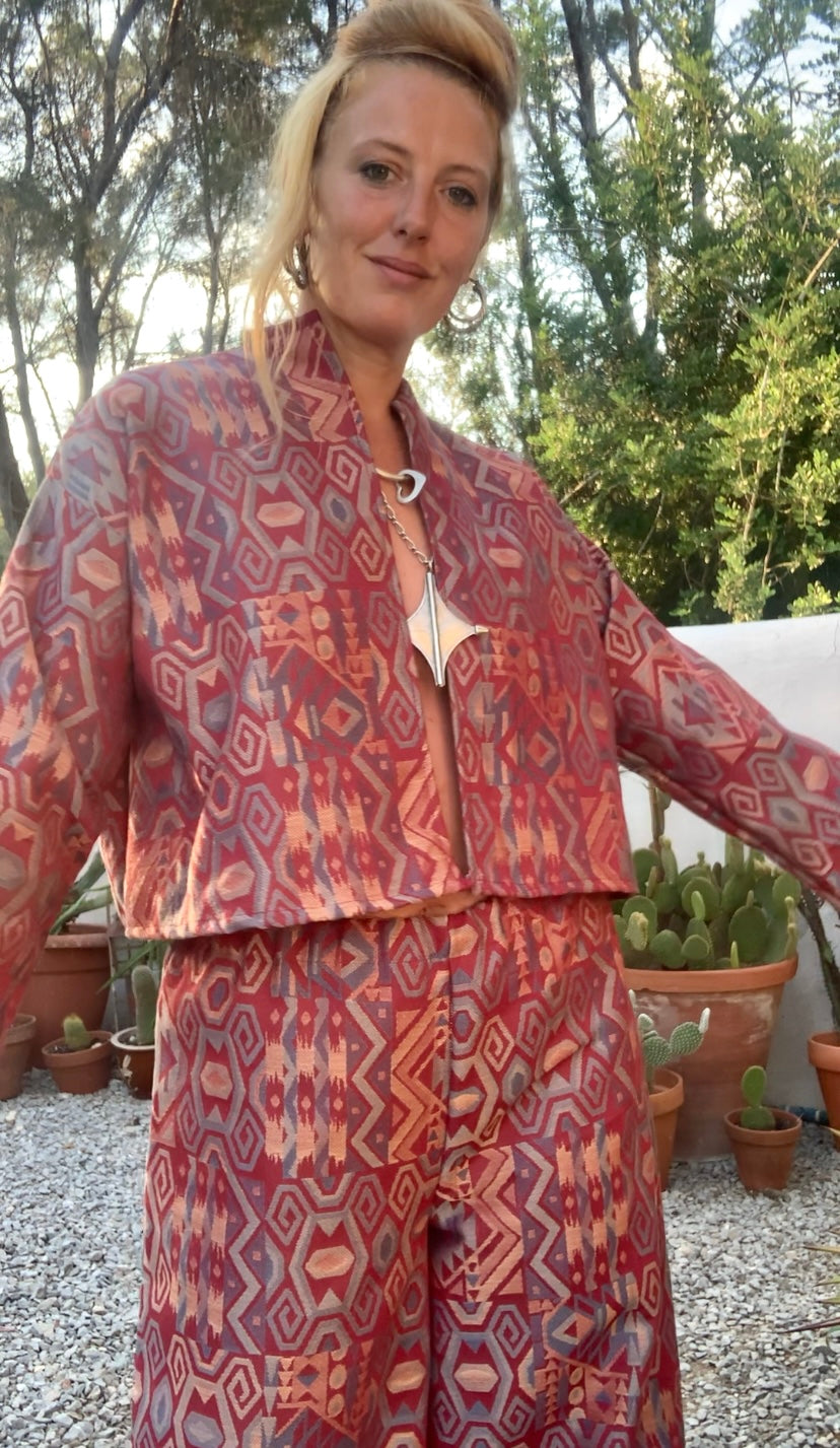 Very cool 1970’s upholstery fabrics in burgundy and blue tones wide leg pants by Vagabond Ibiza from recycled dead stock fabrics or