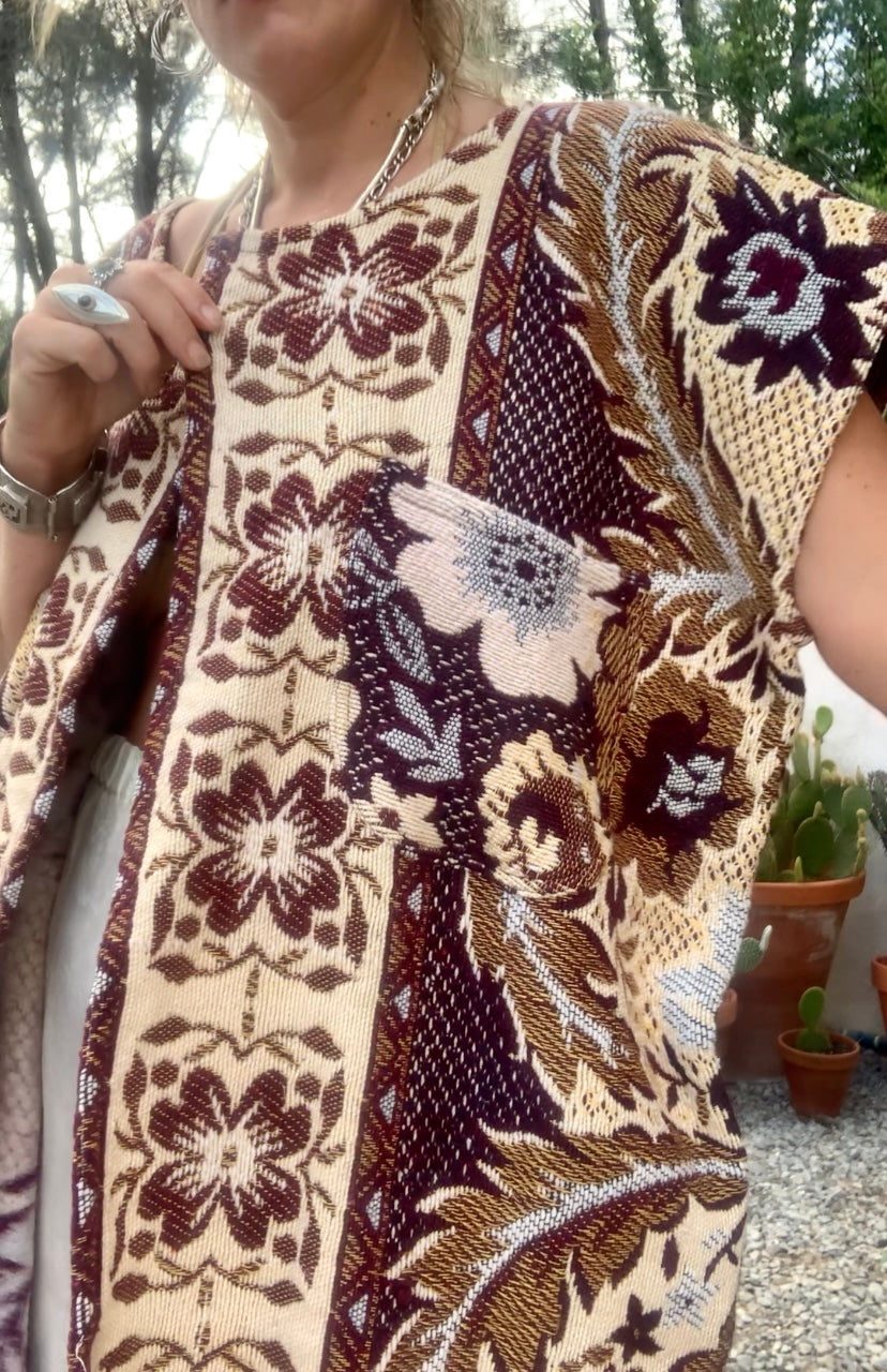 Up-cycled vintage blanket waistcoat jackets by Vagabond Ibiza with a brown and cream woven outside textiles lined with patterns fleece